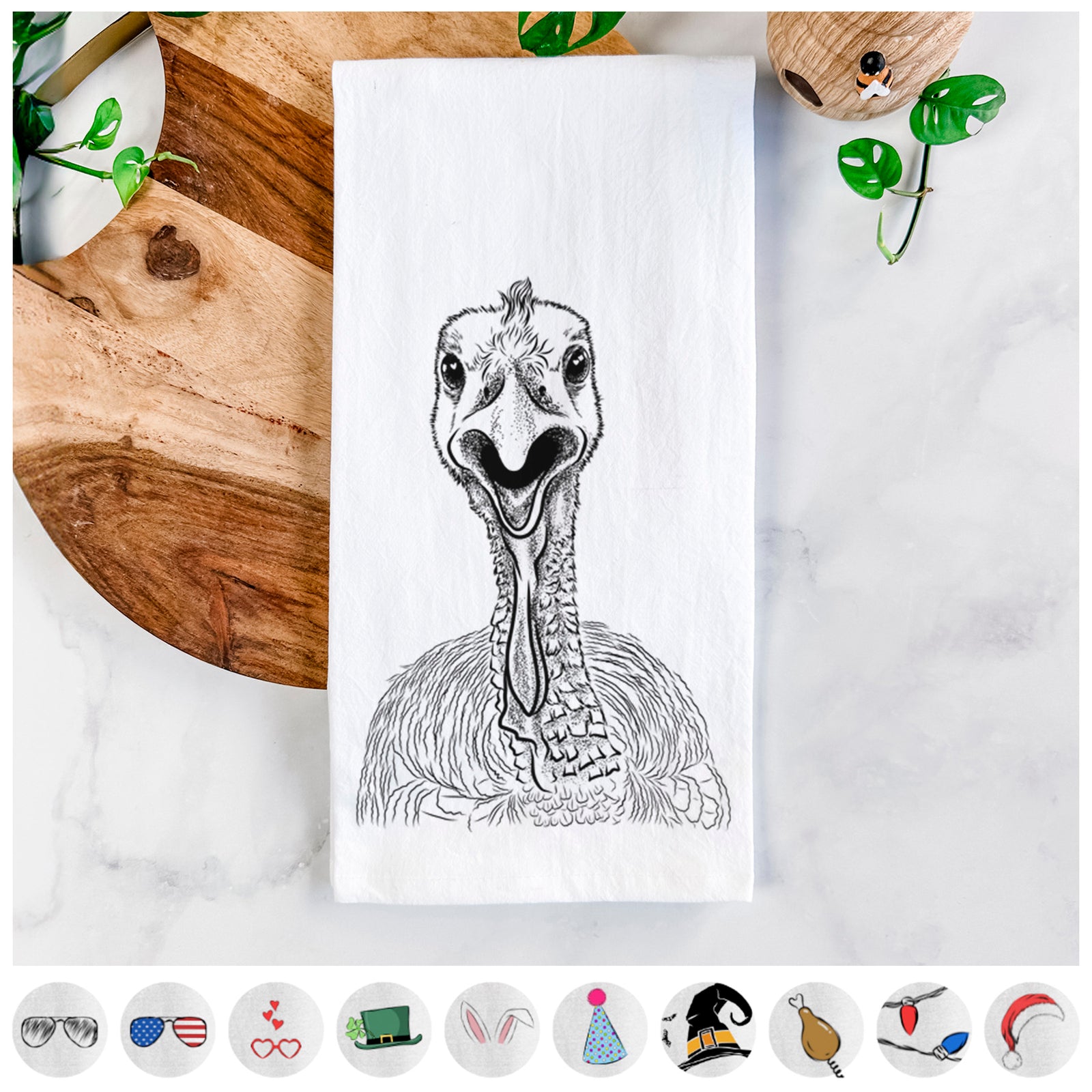 Hand-drawn sketch of Gobble the Turkey on a tea towel, shown with icons of the other available costume styles