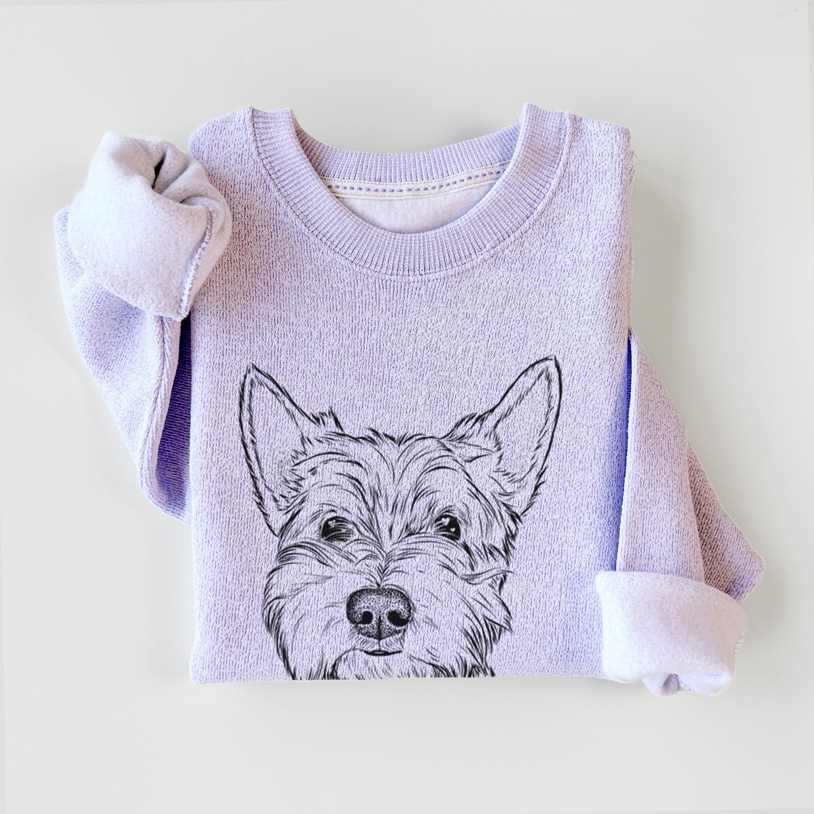 Hand-drawn sketch of Grizel the West Highland Terrier on an Ice Purple knit sweatshirt