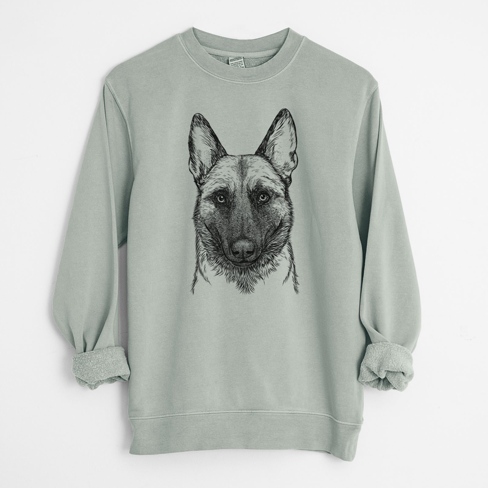 Hand-drawn sketch of Gunther the Belgian Malinois on a Sage Unisex pigment dyed crew sweatshirt