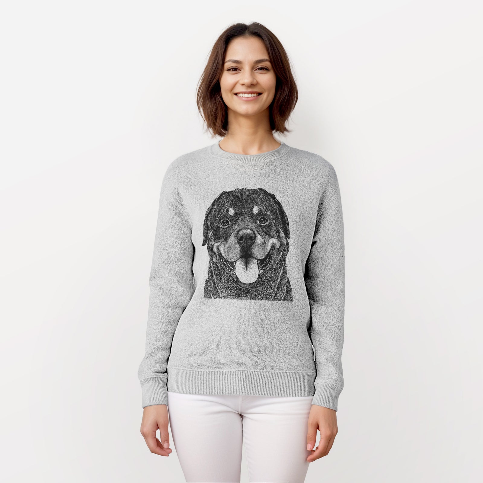 Hand-drawn sketch of Hagan the Rottweiler on a knit sweatshirt, worn by a woman