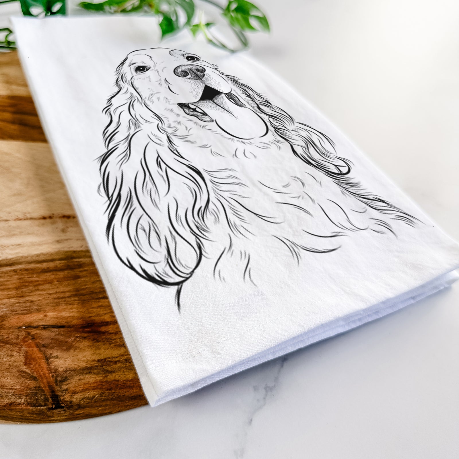 Hand-drawn sketch of Happy Henry the English Cocker Spaniel on a tea towel