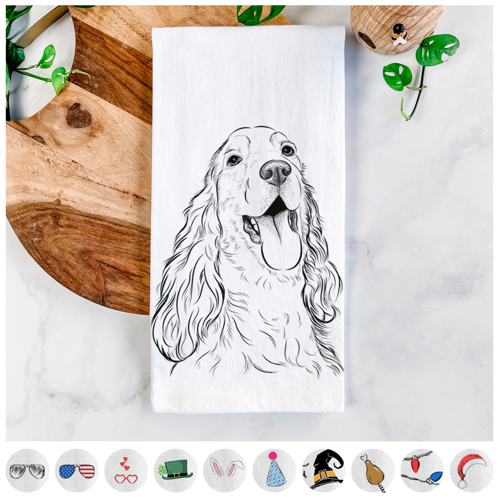 Hand-drawn sketch of Happy Henry the English Cocker Spaniel on a tea towel, shown with icons of the other available costume styles