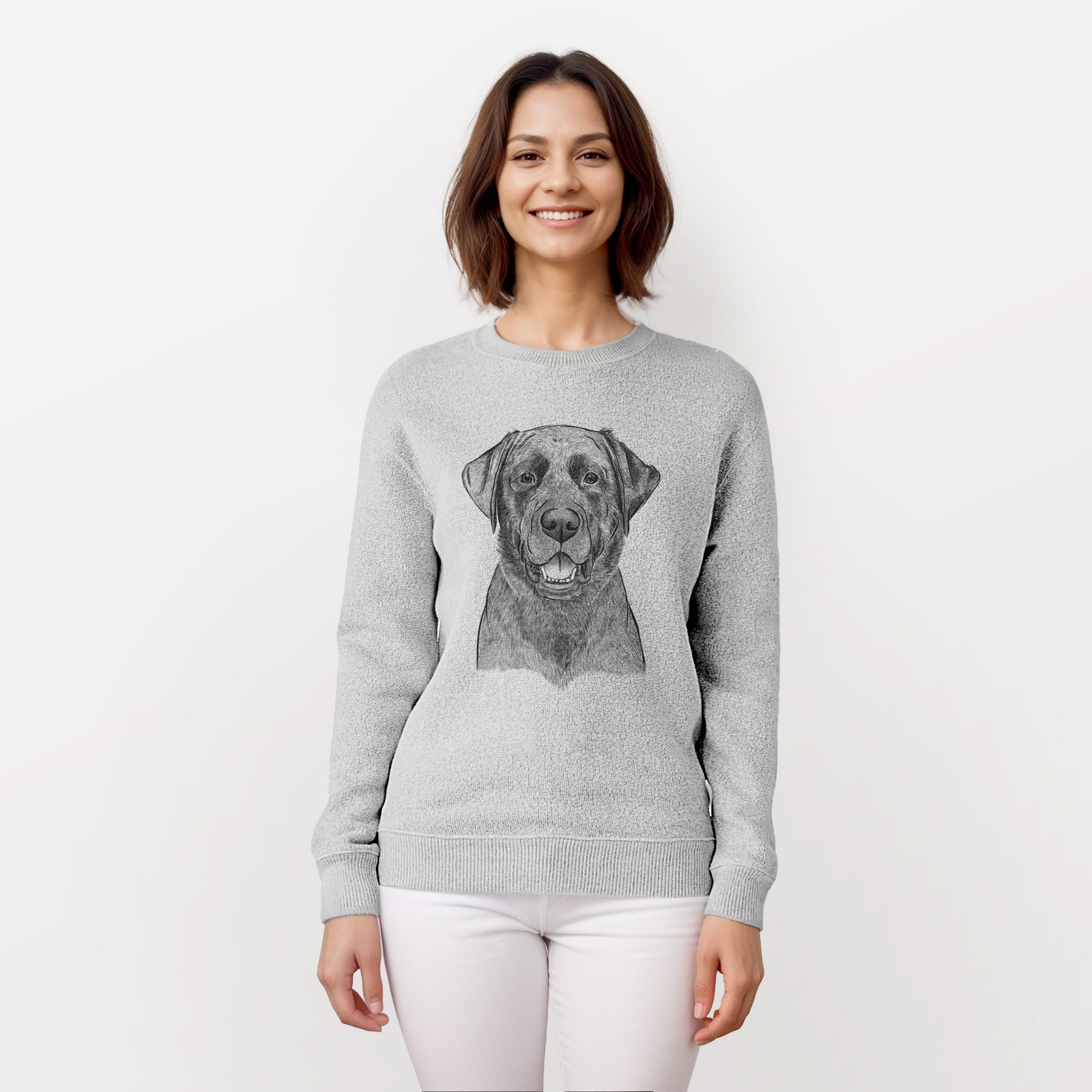 Hand-drawn sketch of Heath the Black Lab on a knit sweatshirt, worn by a woman