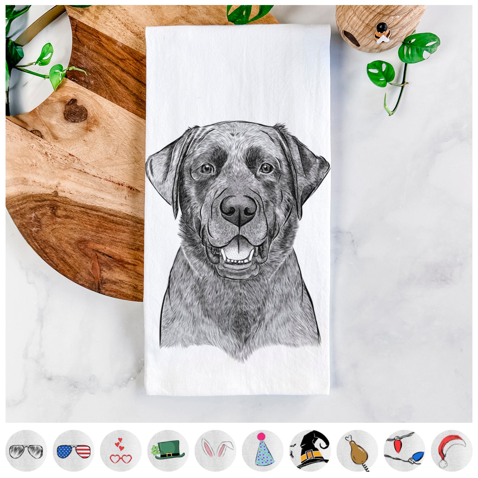 Hand-drawn sketch of Heath the Black Lab on a tea towel, shown with icons of the other available costume styles