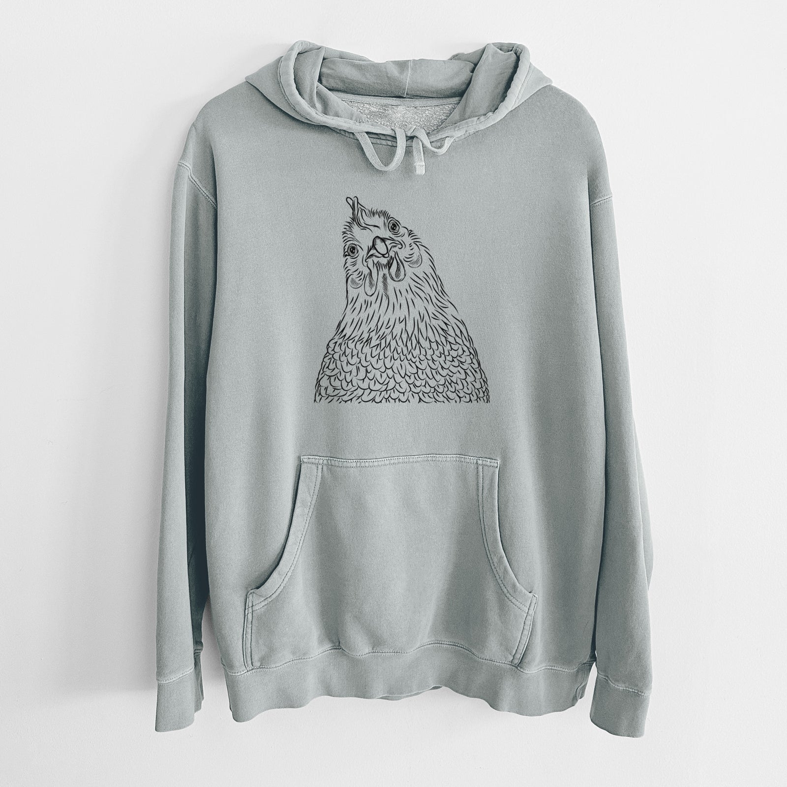 Hand-drawn sketch of Henrietta the Chicken on a Sage Unisex pigment dyed hoodie