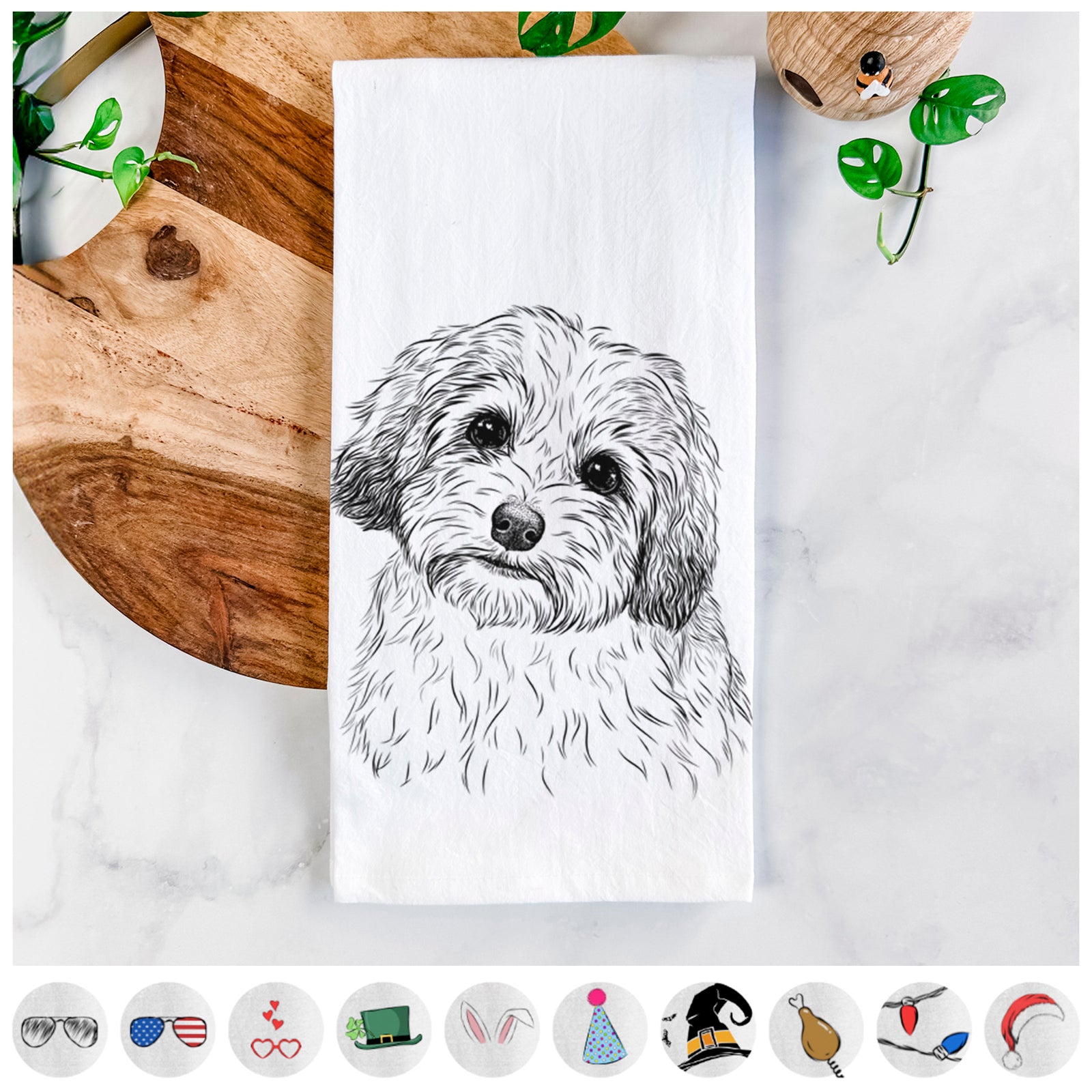 Hand-drawn sketch of Henry the Havanese on a tea towel, shown with icons of the other available costume styles