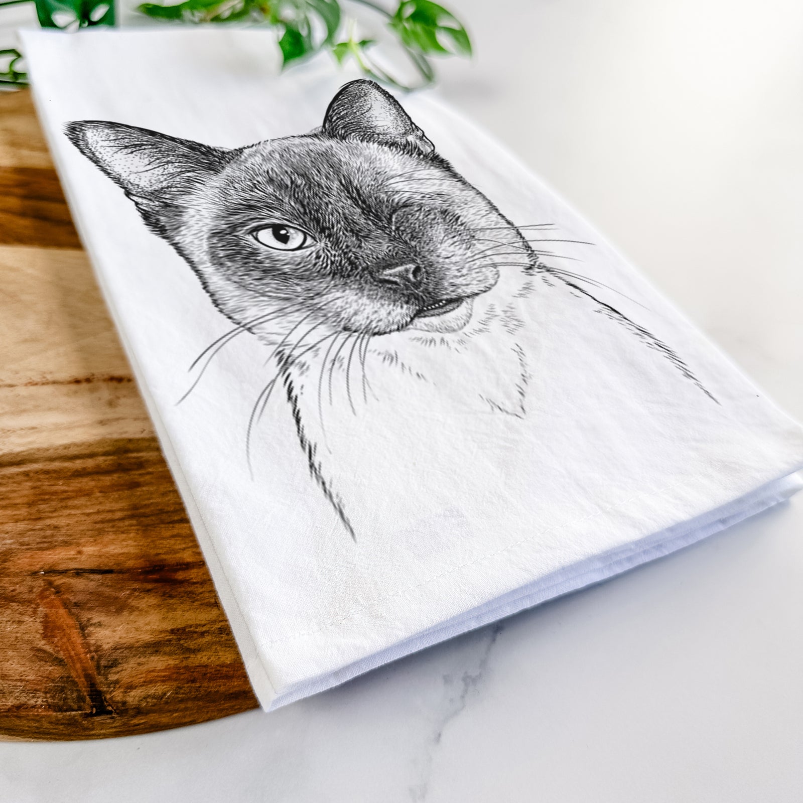 Hand-drawn sketch of Hoggle the Siamese Cat on a tea towel