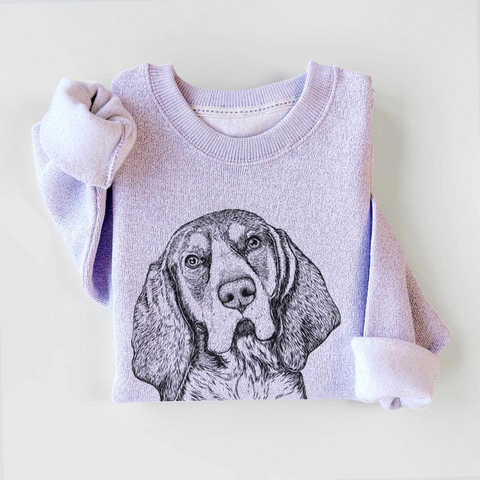 Hand-drawn sketch of Huck the Bluetick Coonhound on an Ice Purple knit sweatshirt