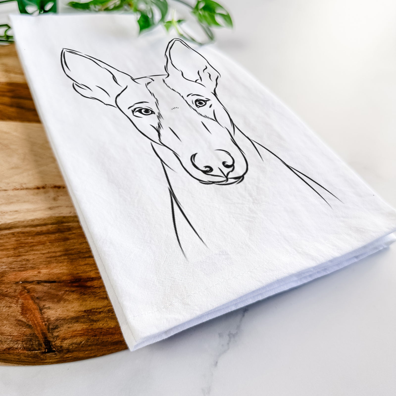 Hand-drawn sketch of Indy the Ibizan Hound on a tea towel