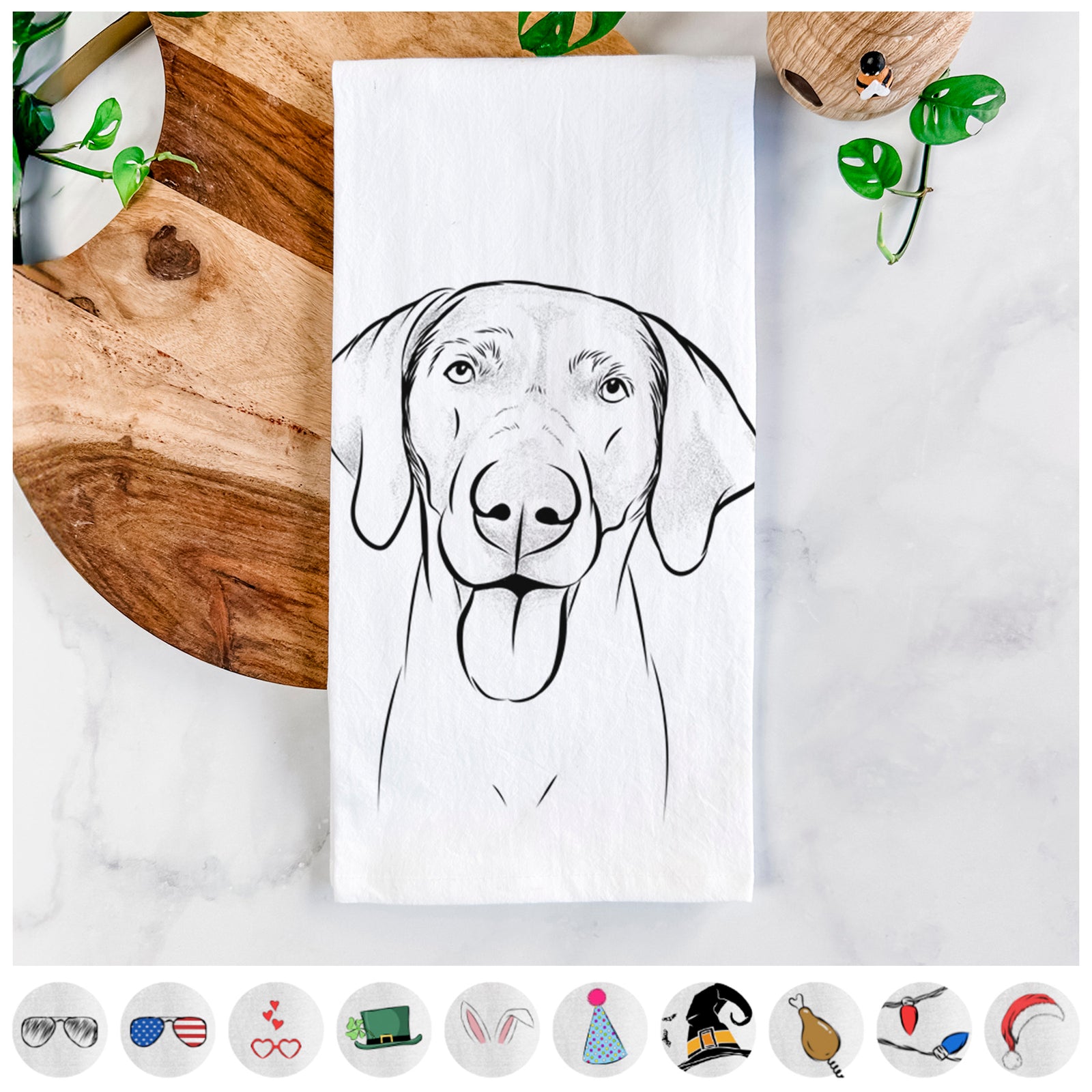 Hand-drawn sketch of Jackson the Weimaraner on a tea towel, shown with icons of the other available costume styles