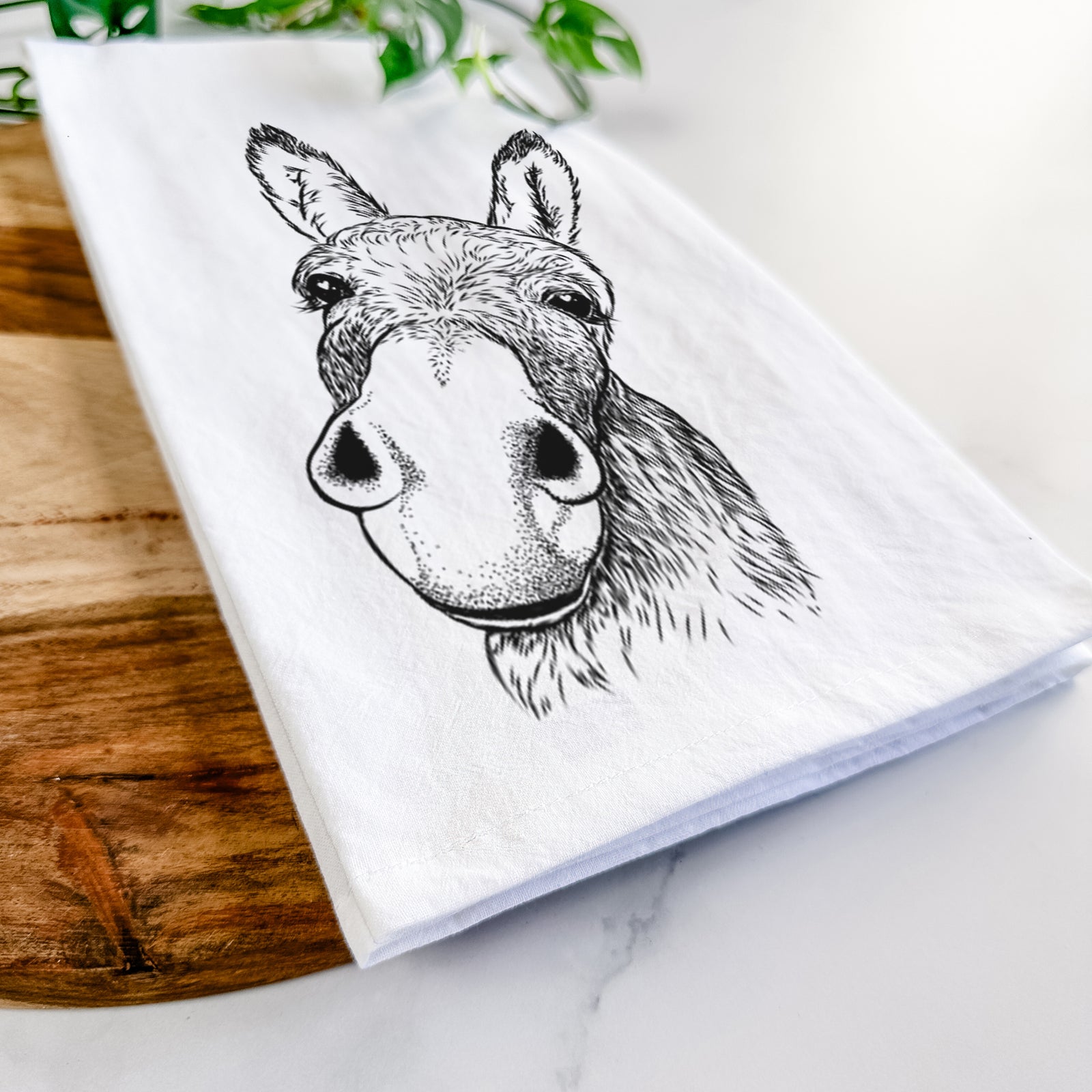 Hand-drawn sketch of Jenny the Donkey on a tea towel