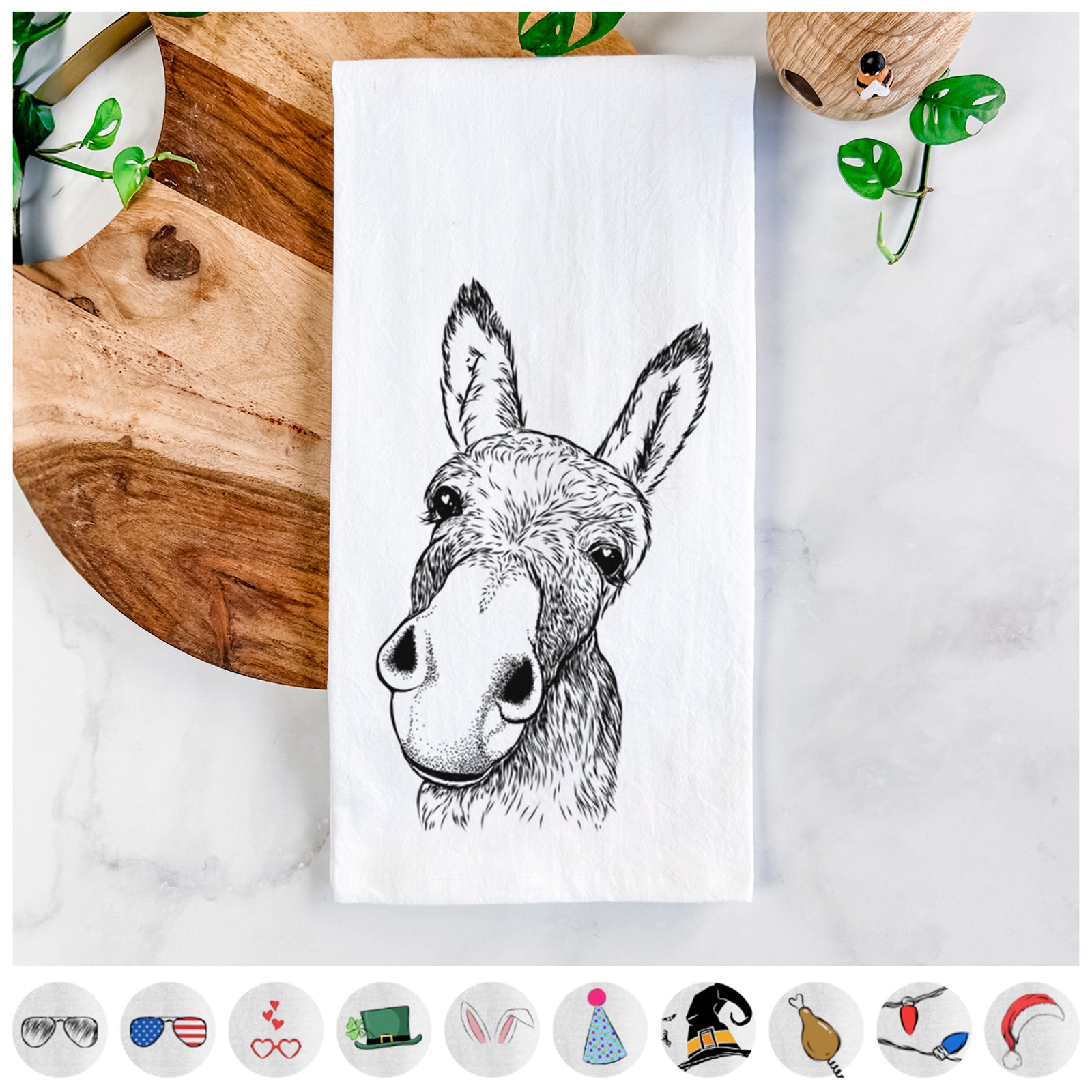 Hand-drawn sketch of Jenny the Donkey on a tea towel, shown with icons of the other available costume styles