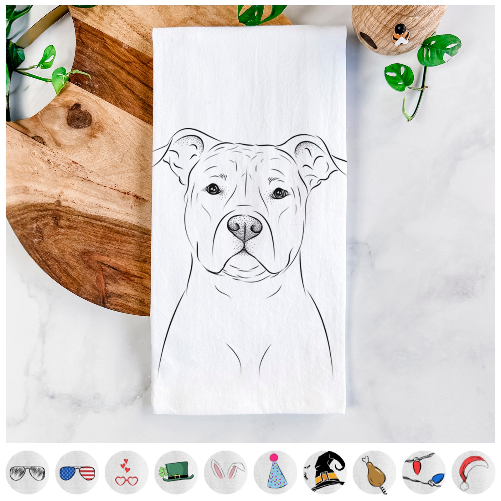Hand-drawn sketch of Jethro the American Staffordshire Terrier on a tea towel, shown with icons of the other available costume styles