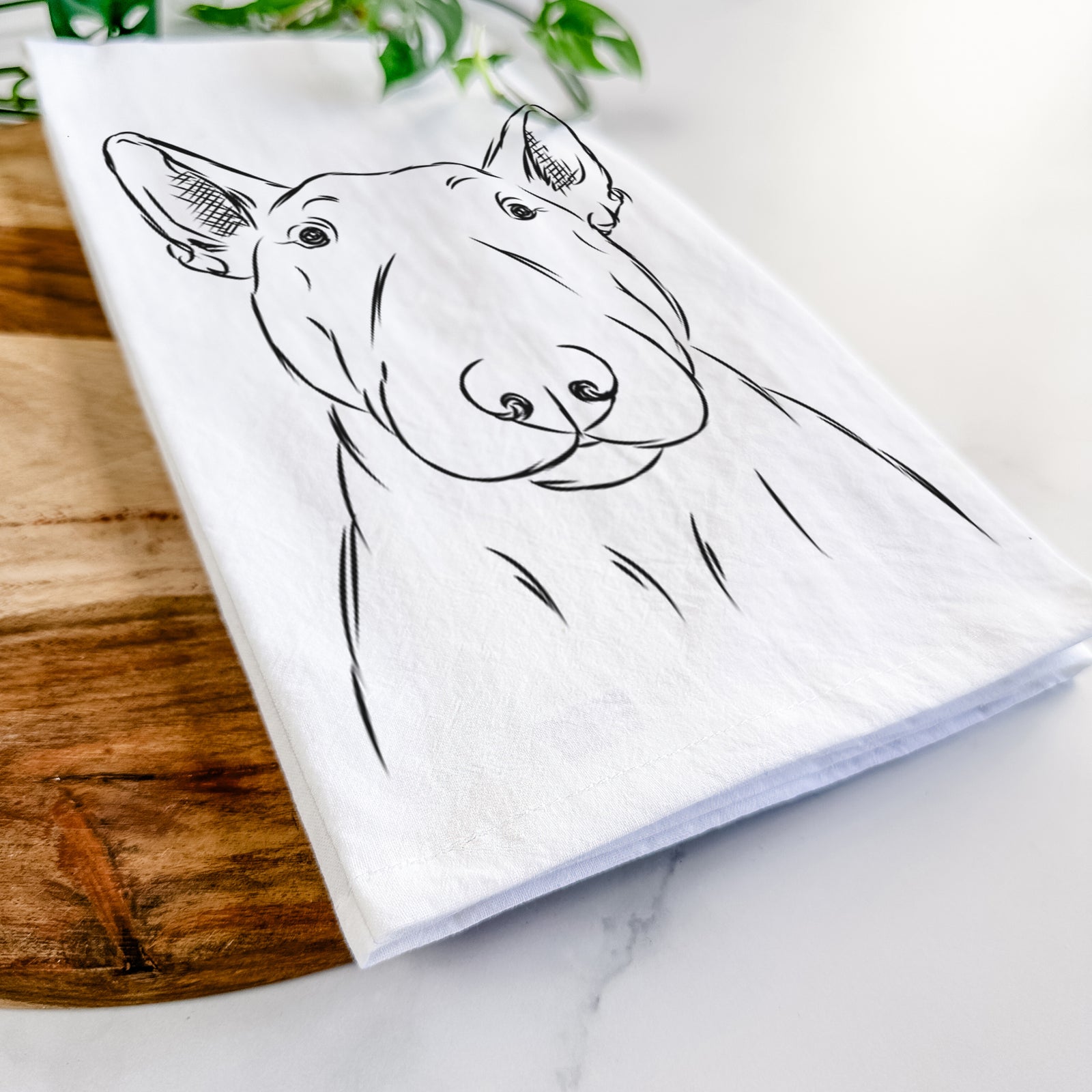 Hand-drawn sketch of Jett the Bull Terrier on a tea towel