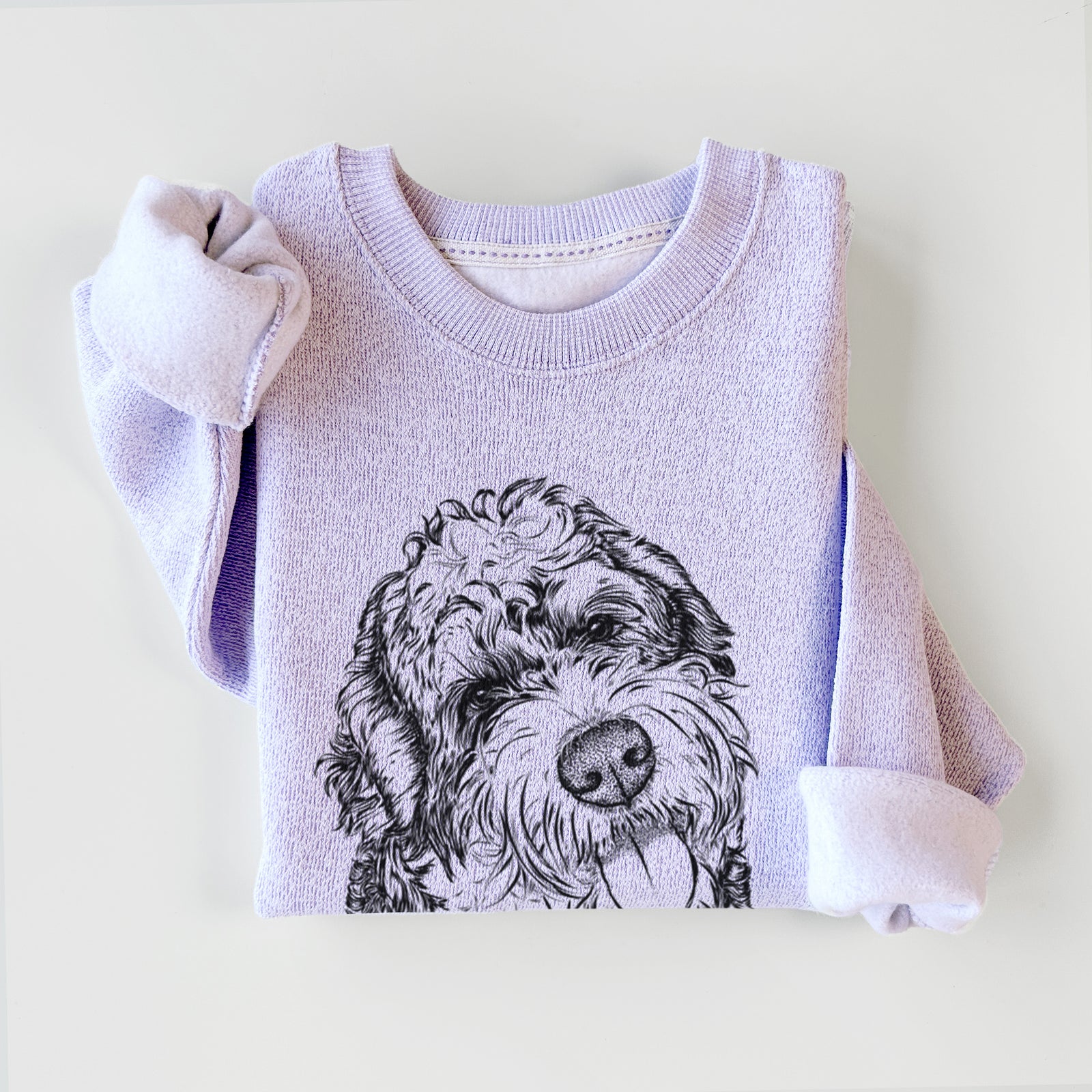 Hand-drawn sketch of Kaci the Bernedoodle on an Ice Purple knit sweatshirt