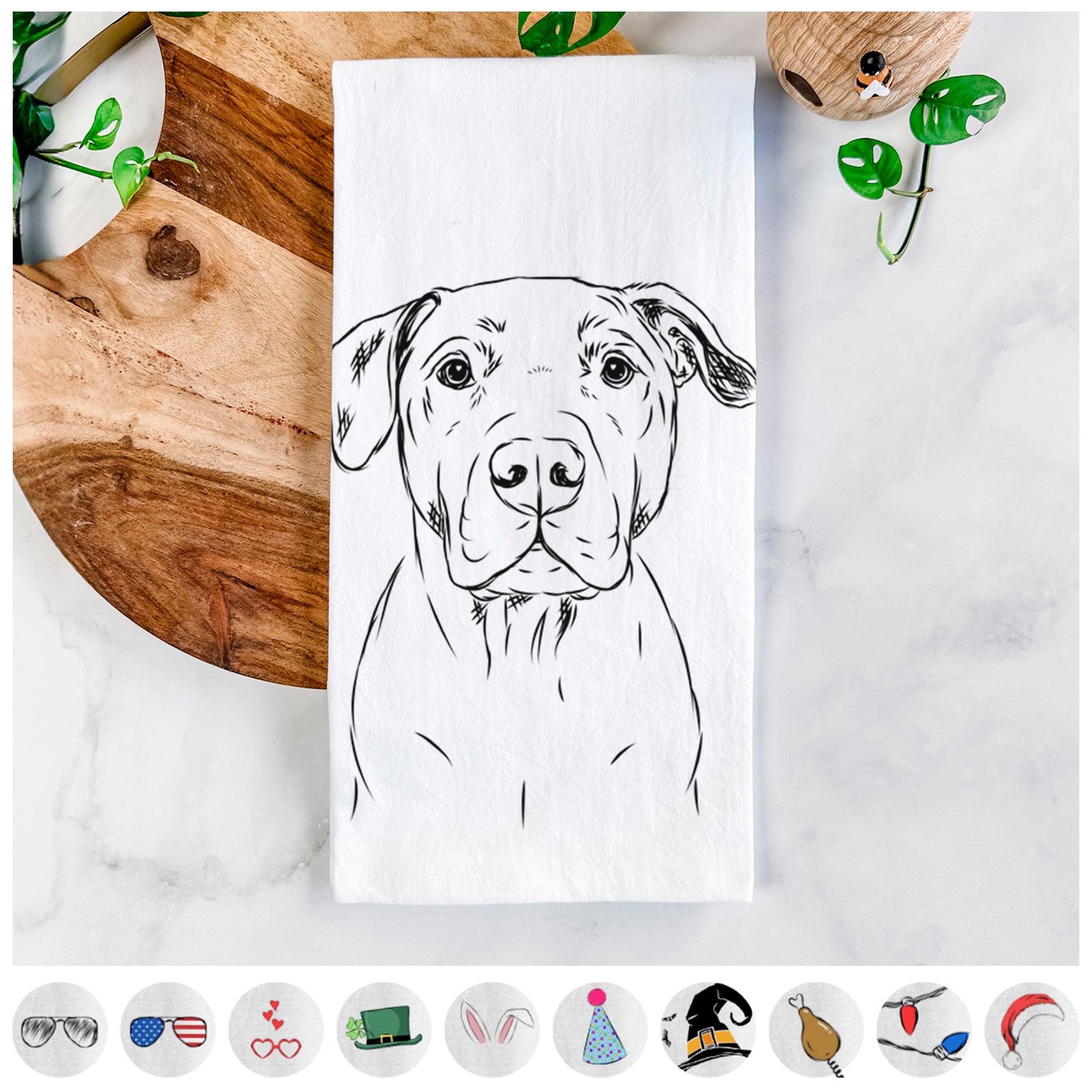 Hand-drawn sketch of Kadin the Pitbull on a tea towel, shown with icons of the other available costume styles