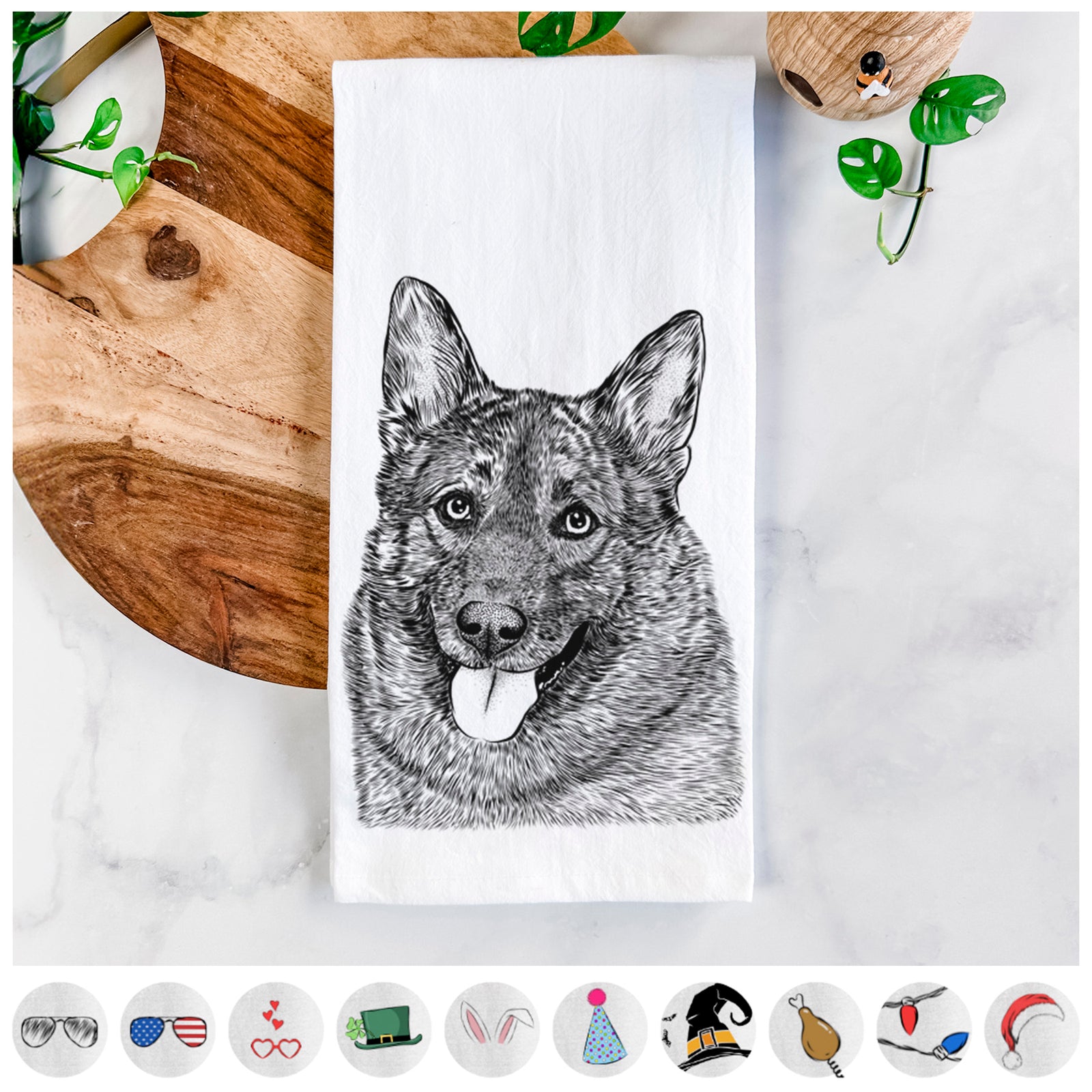 Hand-drawn sketch of Kasia the Norwegian Elkhound on a tea towel, shown with icons of the other available costume styles