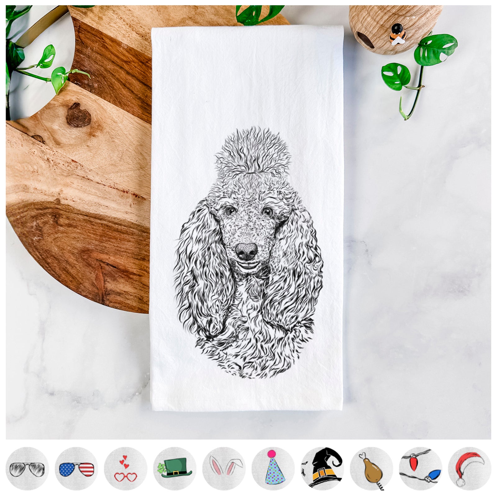 Hand-drawn sketch of Kenna the Standard Poodle on a tea towel, shown with icons of the other available costume styles