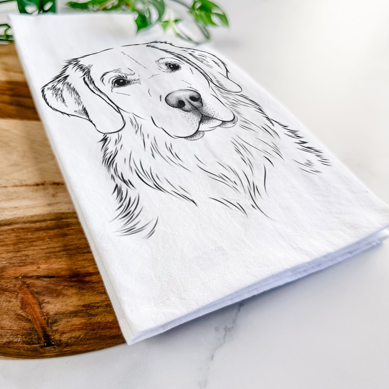 Hand-drawn sketch of Kula the Golden Retriever on a tea towel