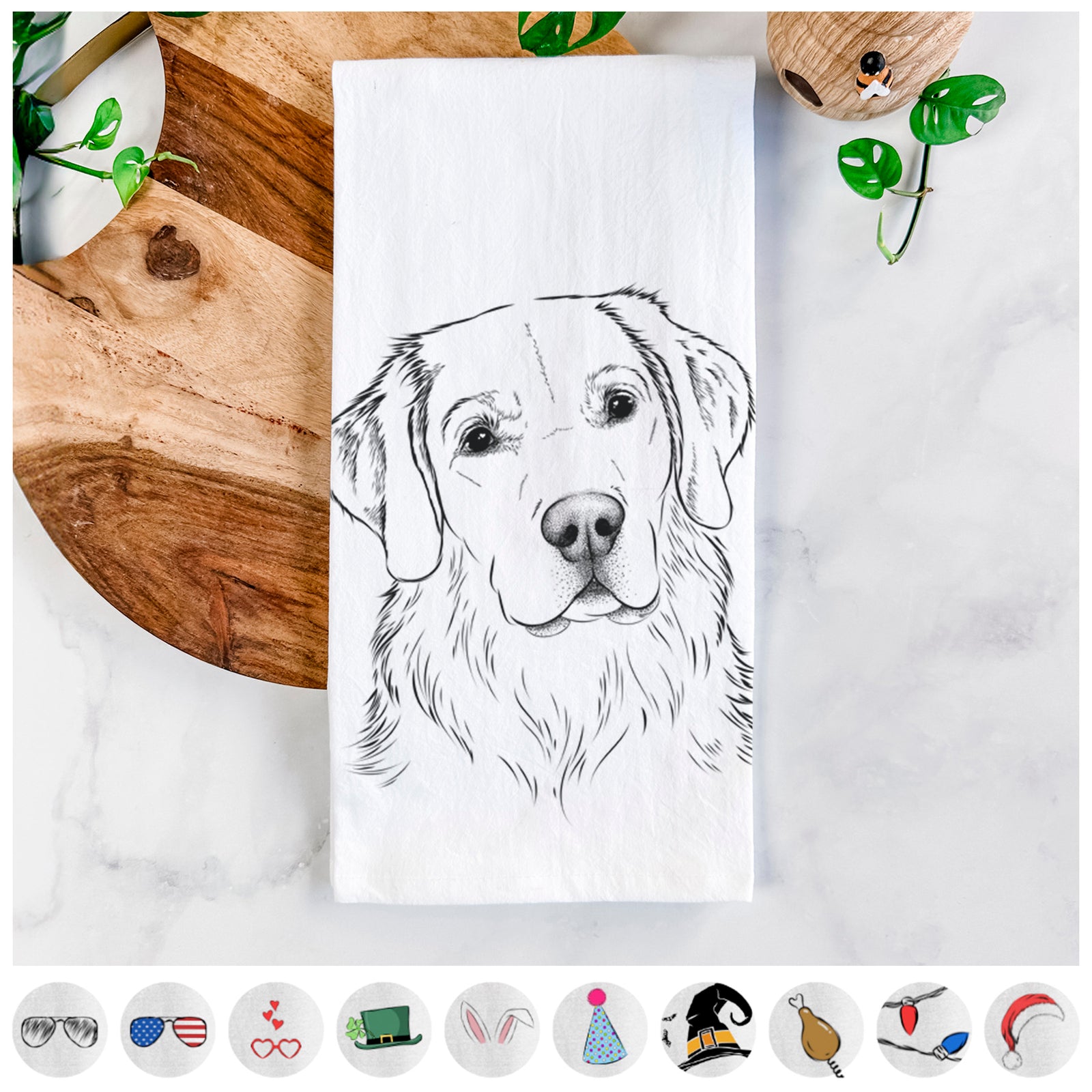 Hand-drawn sketch of Kula the Golden Retriever on a tea towel, shown with icons of the other available costume styles