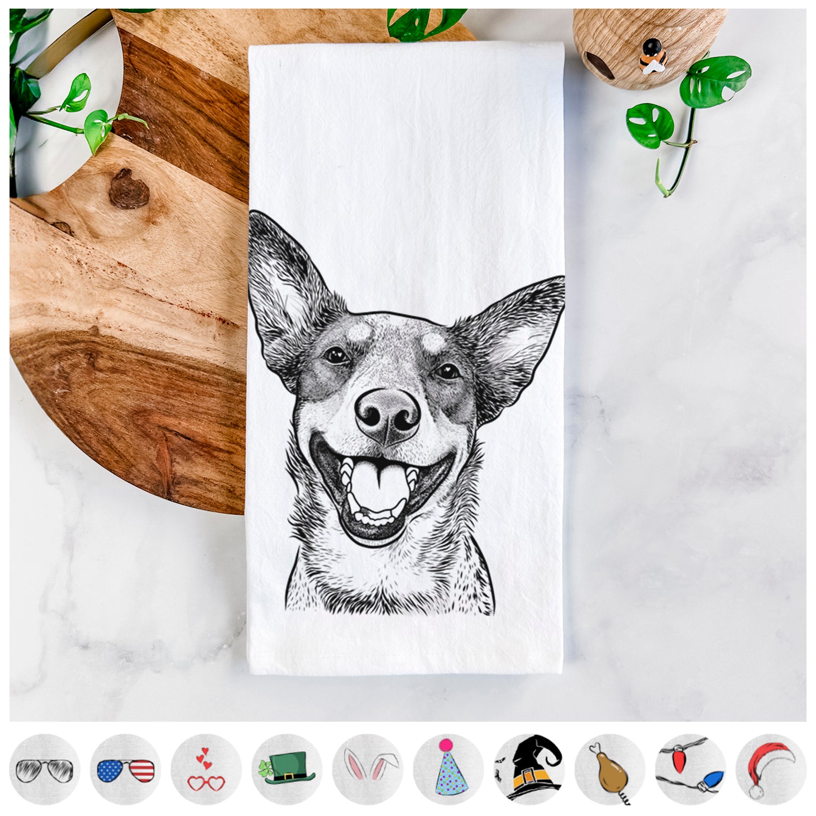 Hand-drawn sketch of Lily the Australian Cattle Dog on a tea towel, shown with icons of the other available costume styles