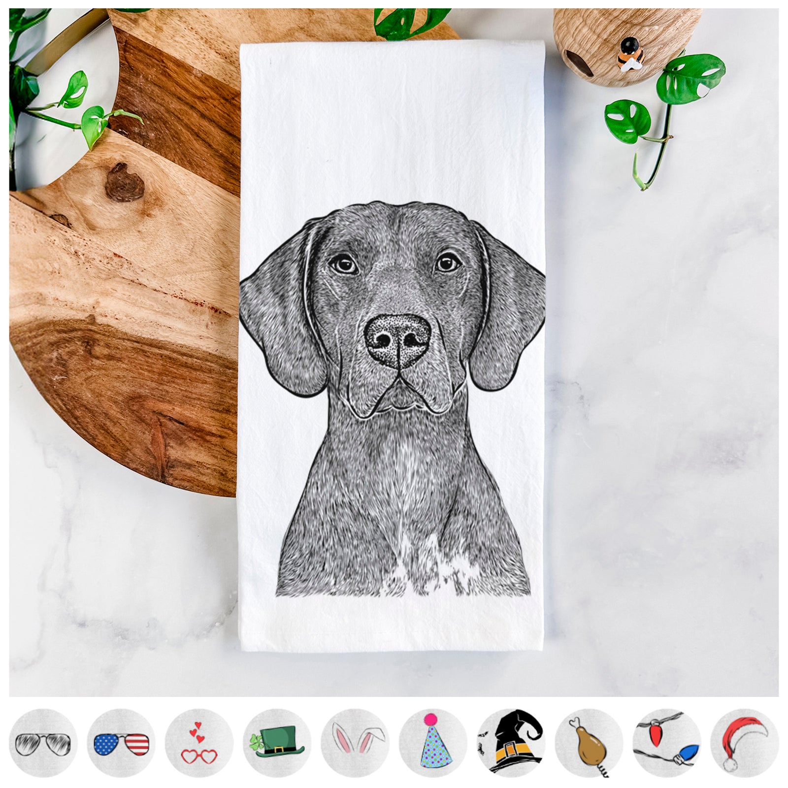 Hand-drawn sketch of Lucifer the German Shorthaired Pointer on a tea towel, shown with icons of the other available costume styles