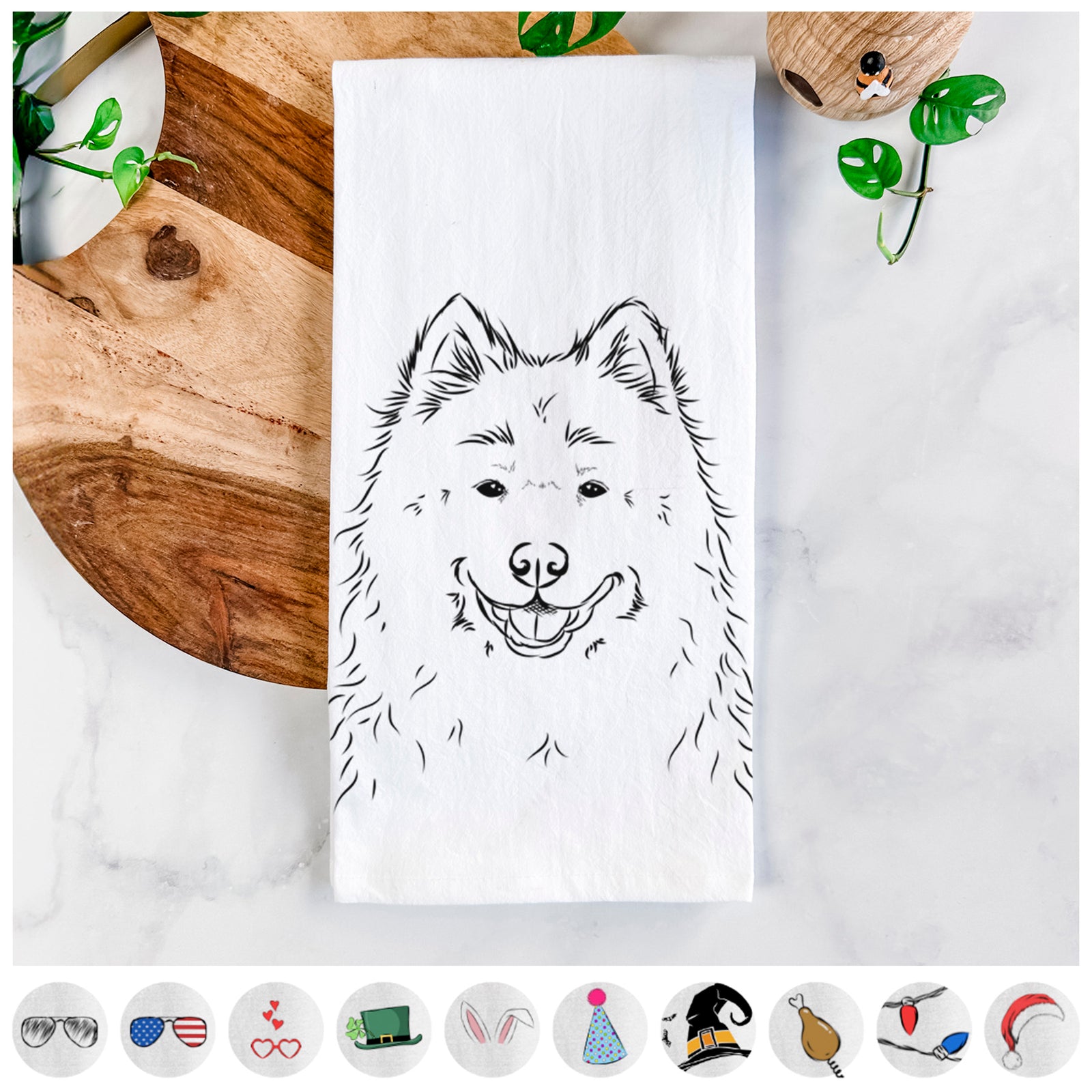 Hand-drawn sketch of Luka the Samoyed on a tea towel, shown with icons of the other available costume styles