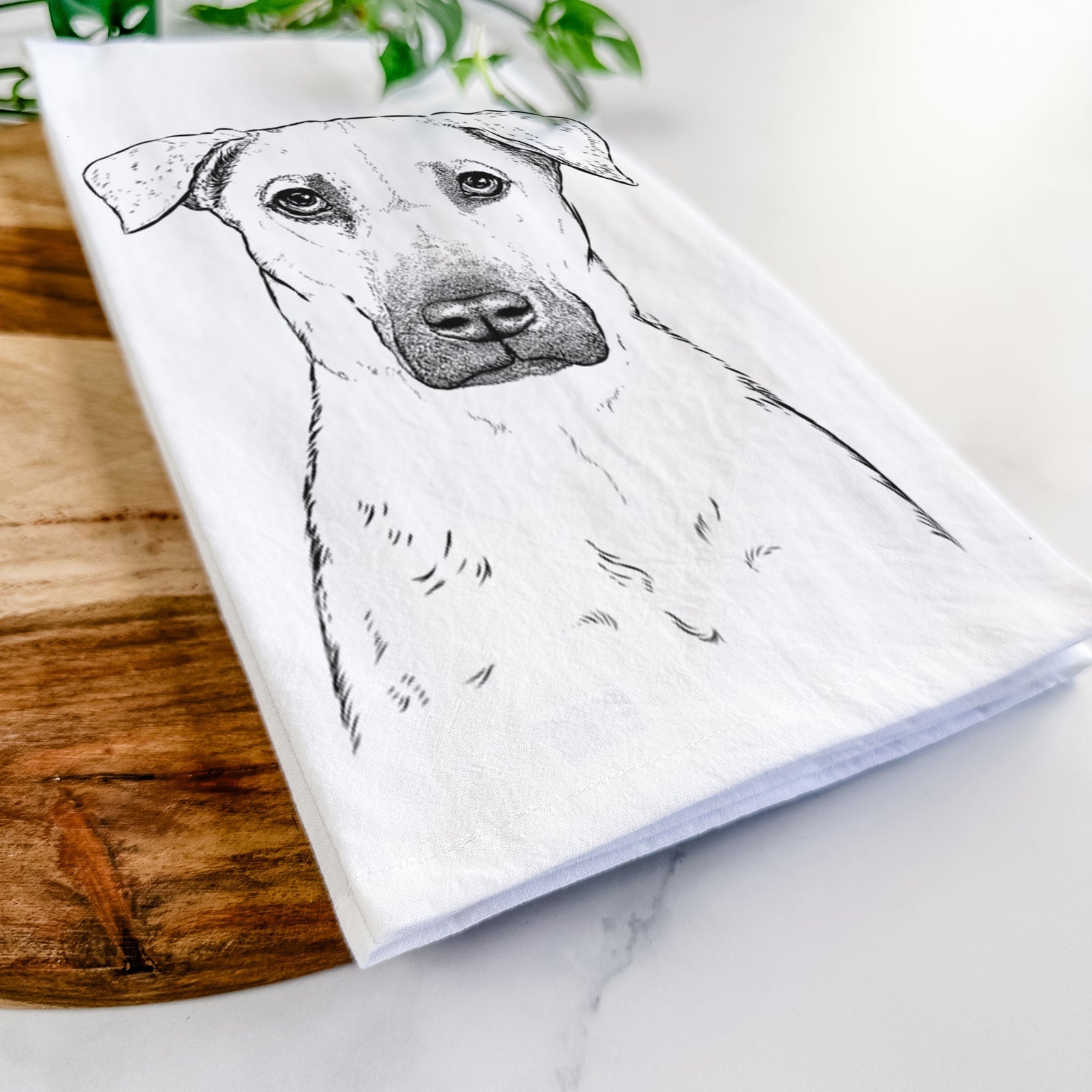 Hand-drawn sketch of Luna the Black Mouth Cur on a tea towel