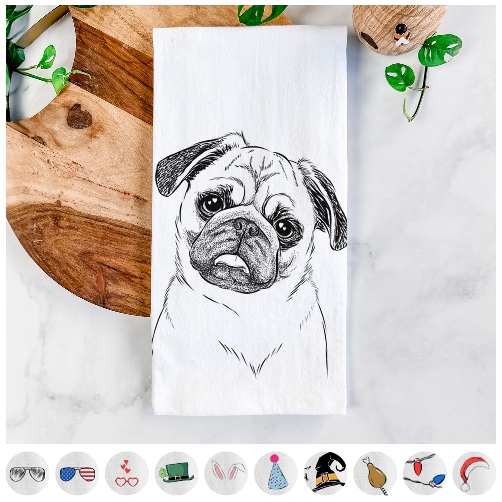 Hand-drawn sketch of Macy the Pug on a tea towel, shown with icons of the other available costume styles