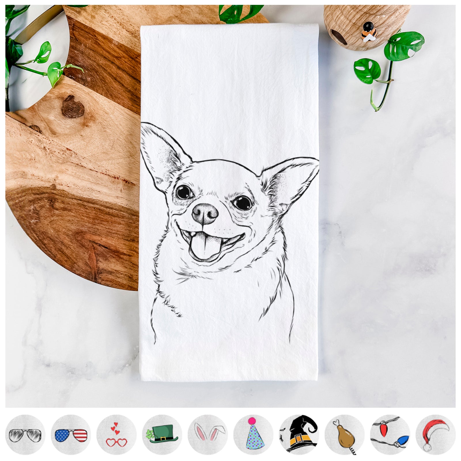 Hand-drawn sketch of Maddison Pearl the Chihuahua on a tea towel, shown with icons of the other available costume styles
