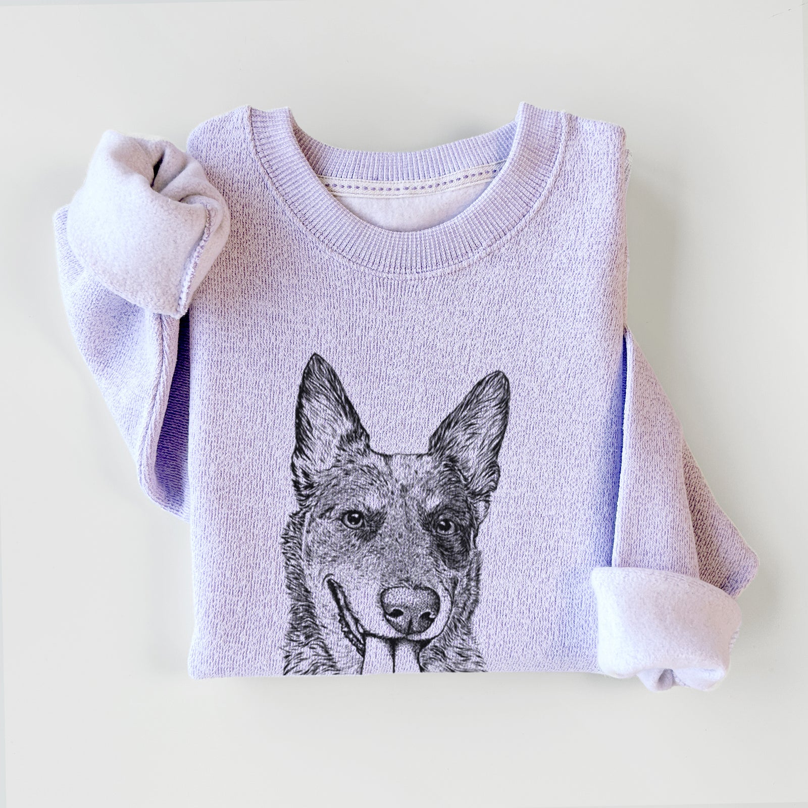 Hand-drawn sketch of Madison the Blue Heeler on an Ice Purple knit sweatshirt
