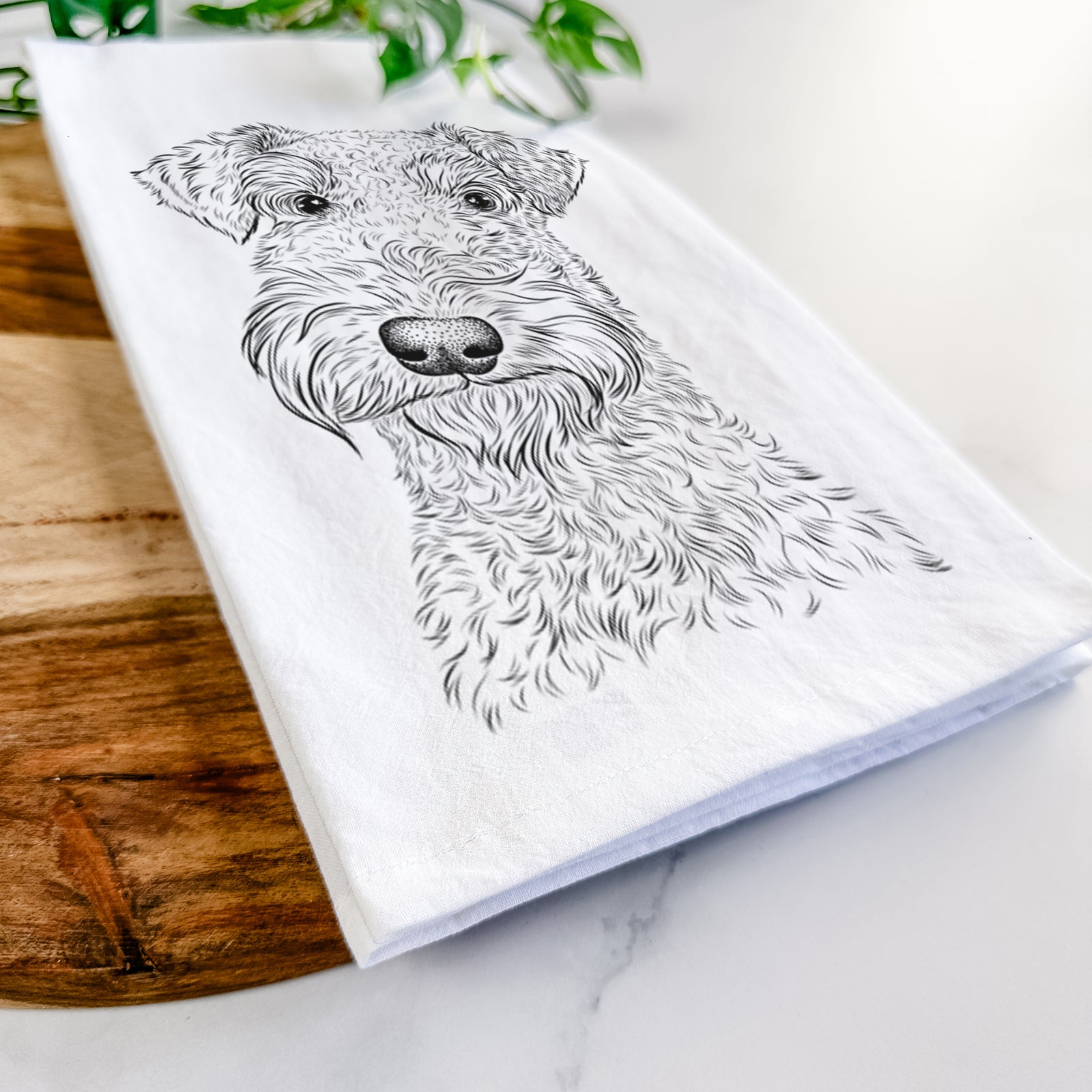 Hand-drawn sketch of Roc Haven Maggie May the Airedale Terrier on a tea towel