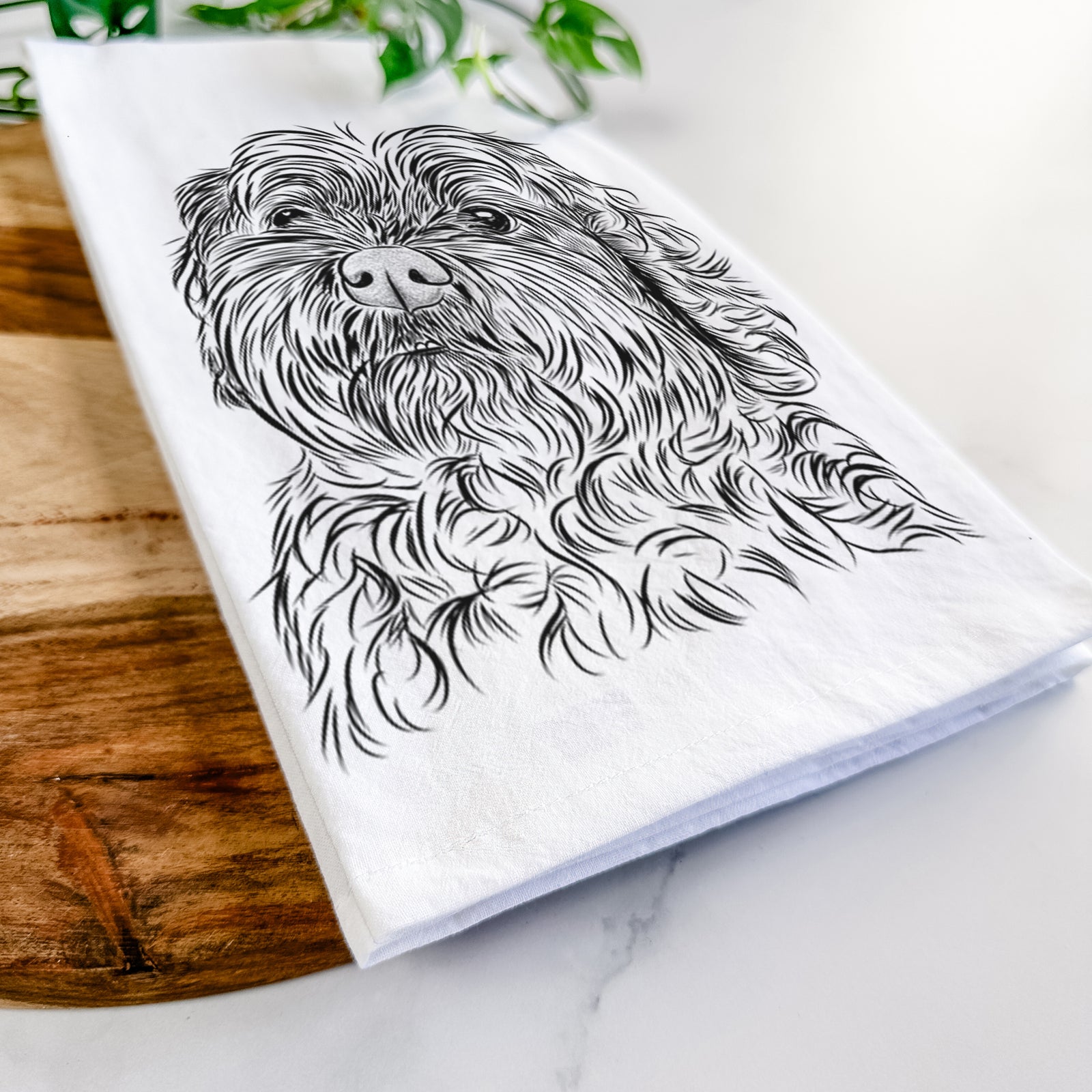 Hand-drawn sketch of Maggie Girl the Cockapoo on a tea towel