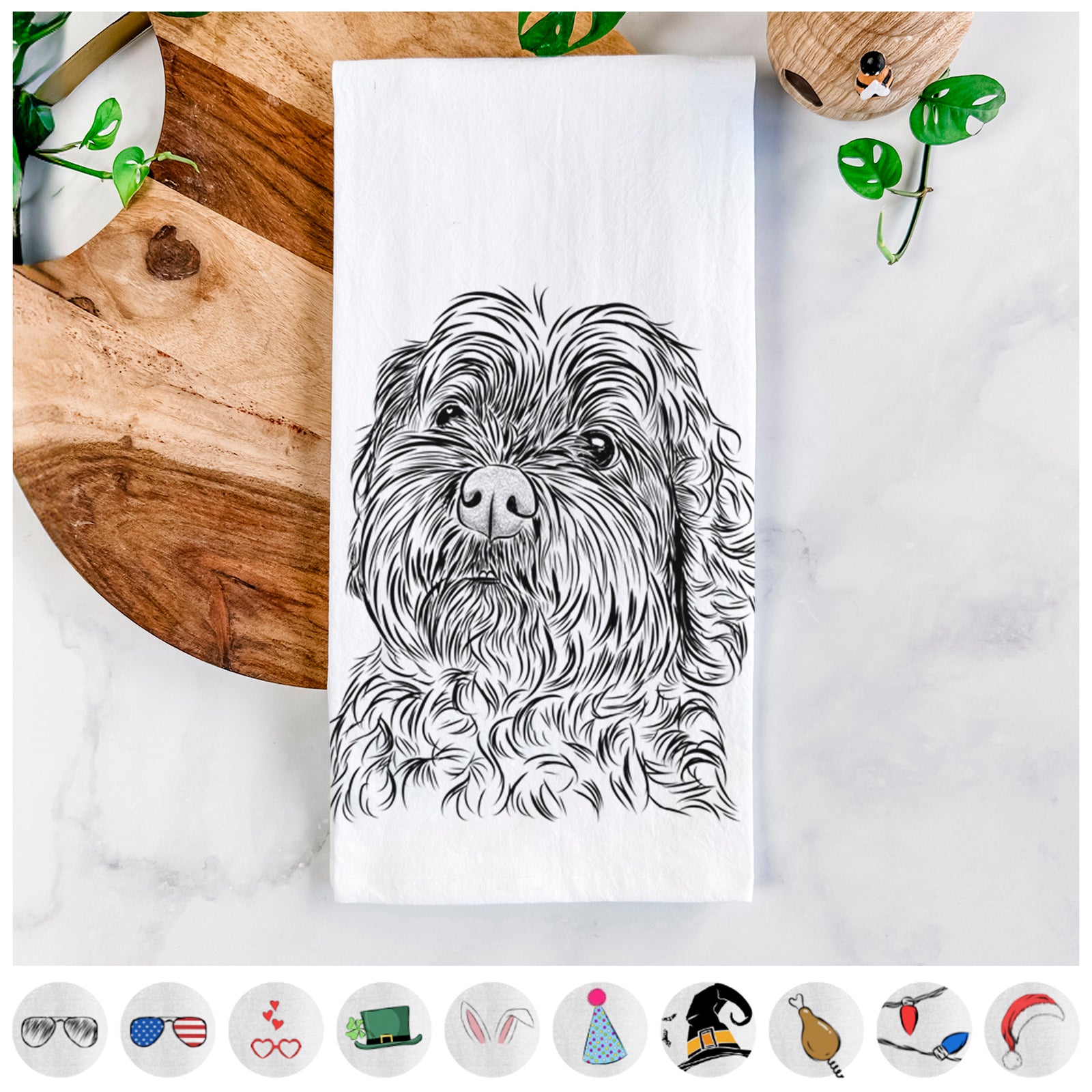 Hand-drawn sketch of Maggie Girl the Cockapoo on a tea towel, shown with icons of the other available costume styles