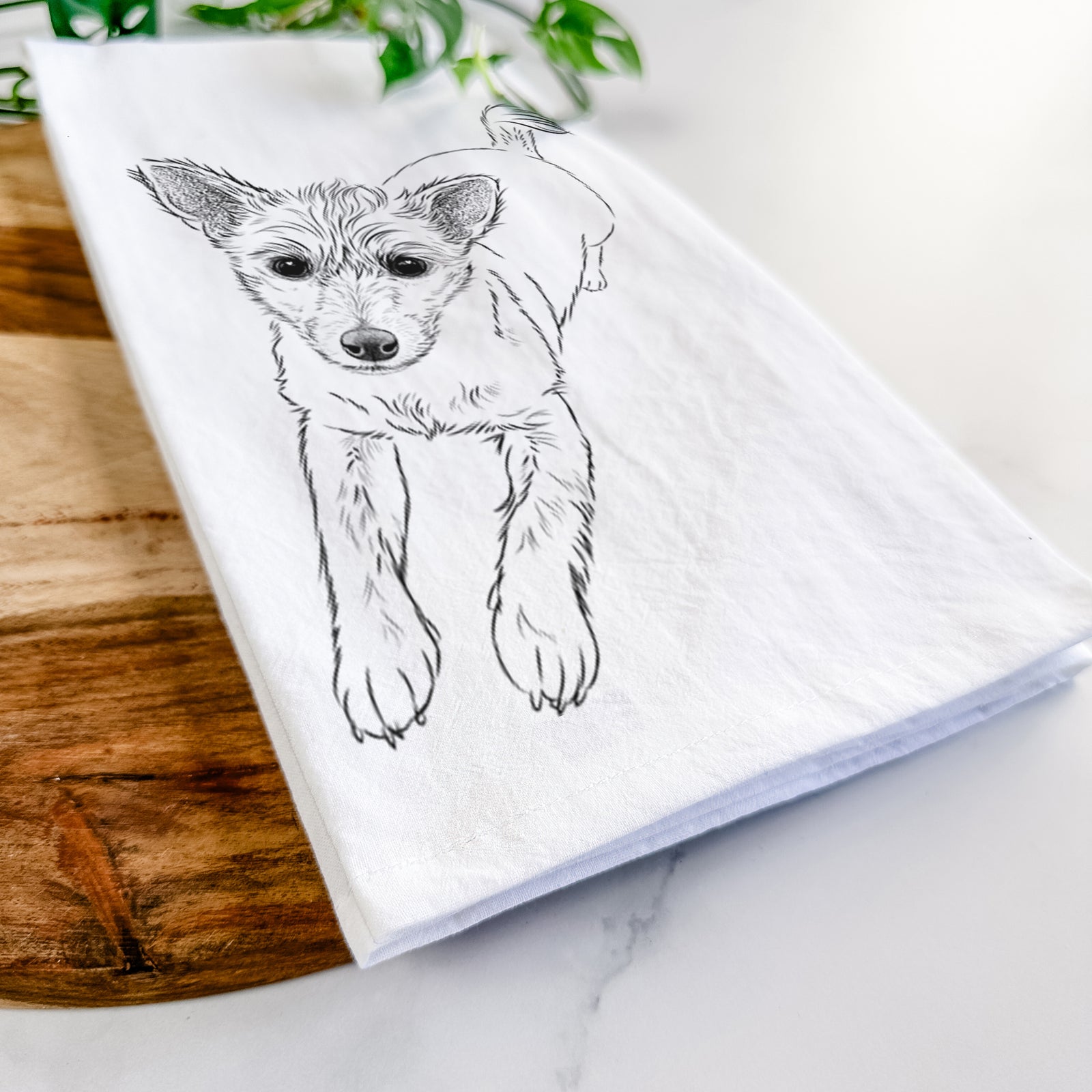 Hand-drawn sketch of Maisie the Terrier Mix on a tea towel