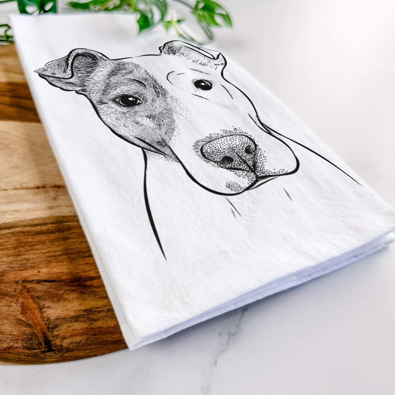Hand-drawn sketch of Manchi the Pitbull Mix on a tea towel