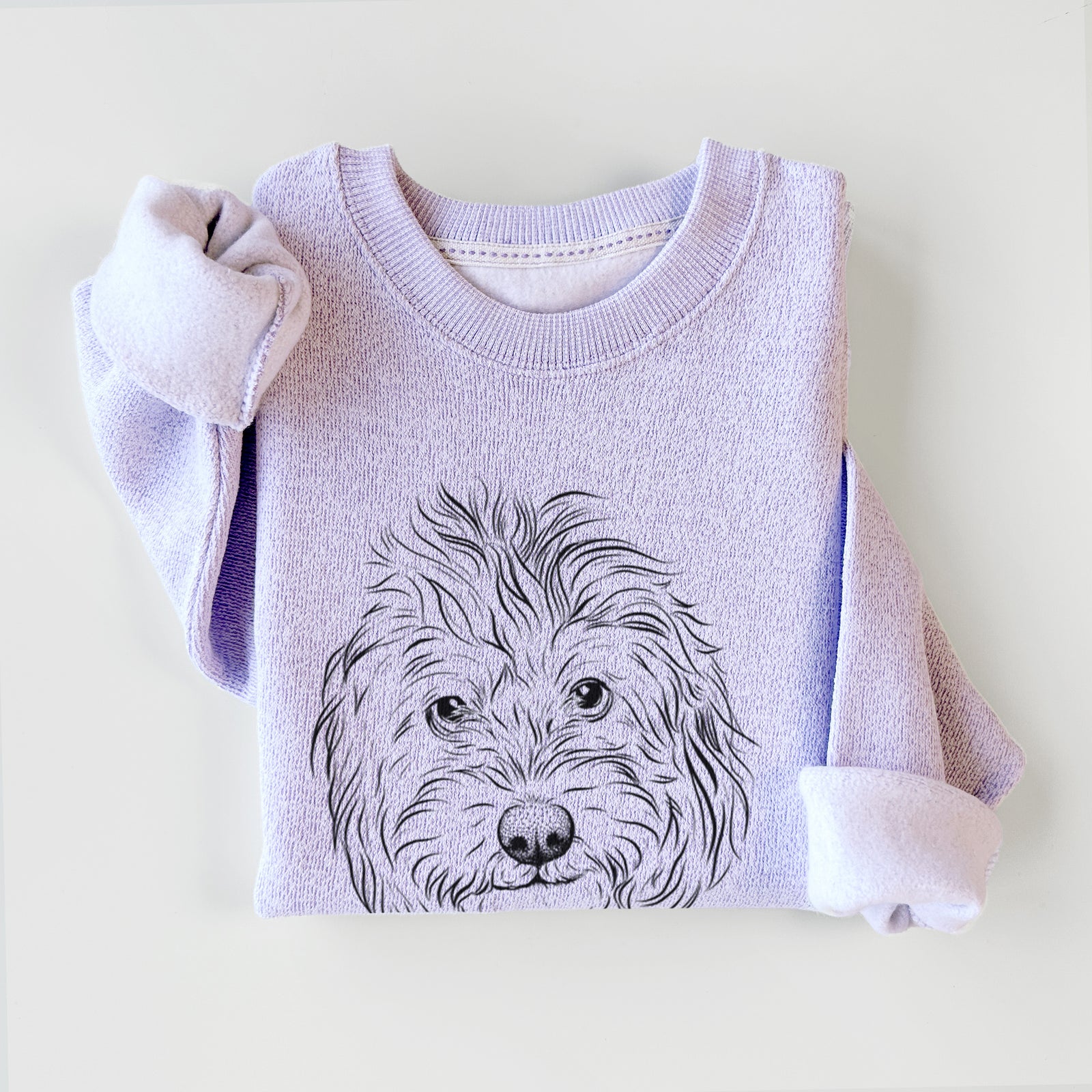 Hand-drawn sketch of Mason the Cavapoo on an Ice Purple knit sweatshirt