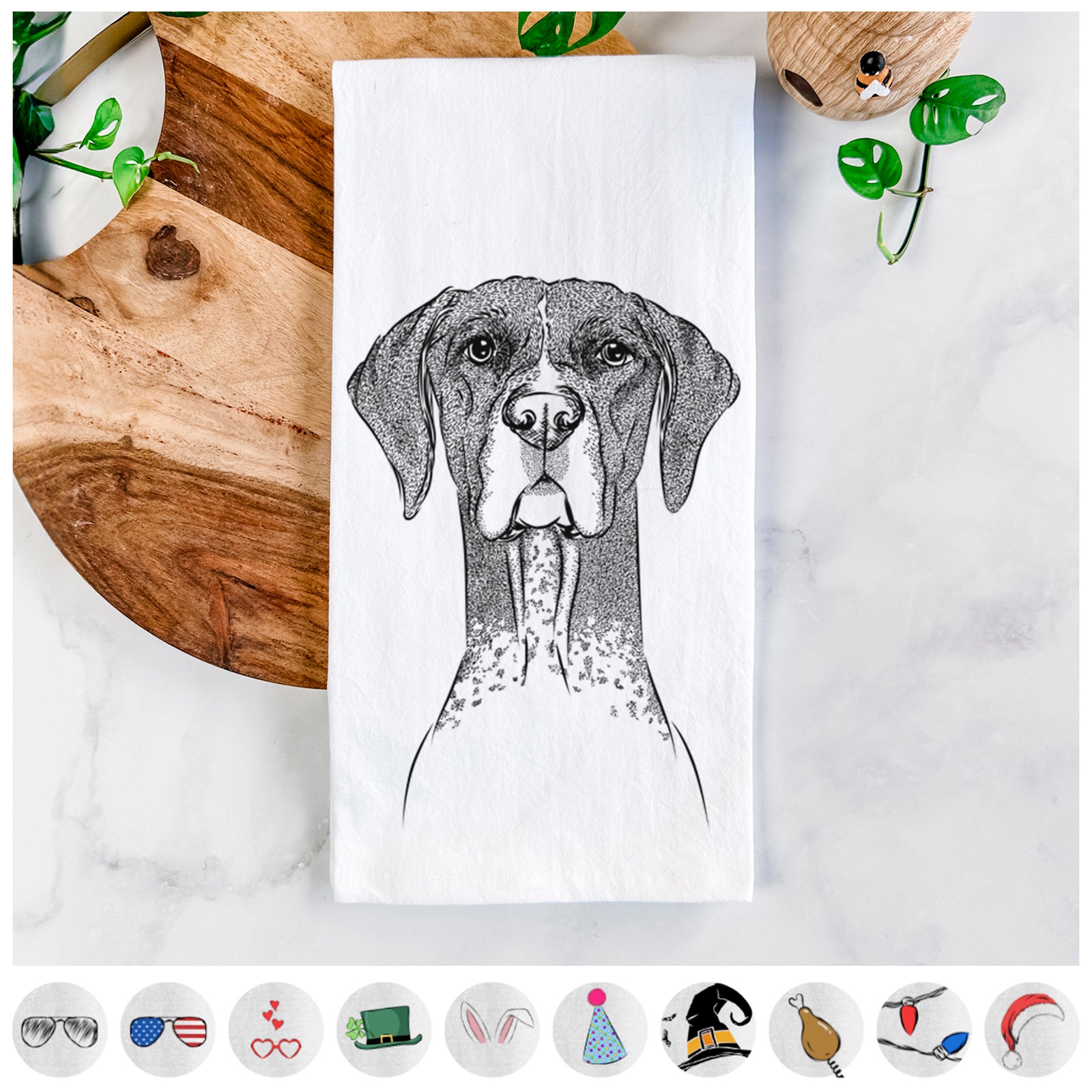 Hand-drawn sketch of Mattis the German Shorthaired Pointer on a tea towel, shown with icons of the other available costume styles