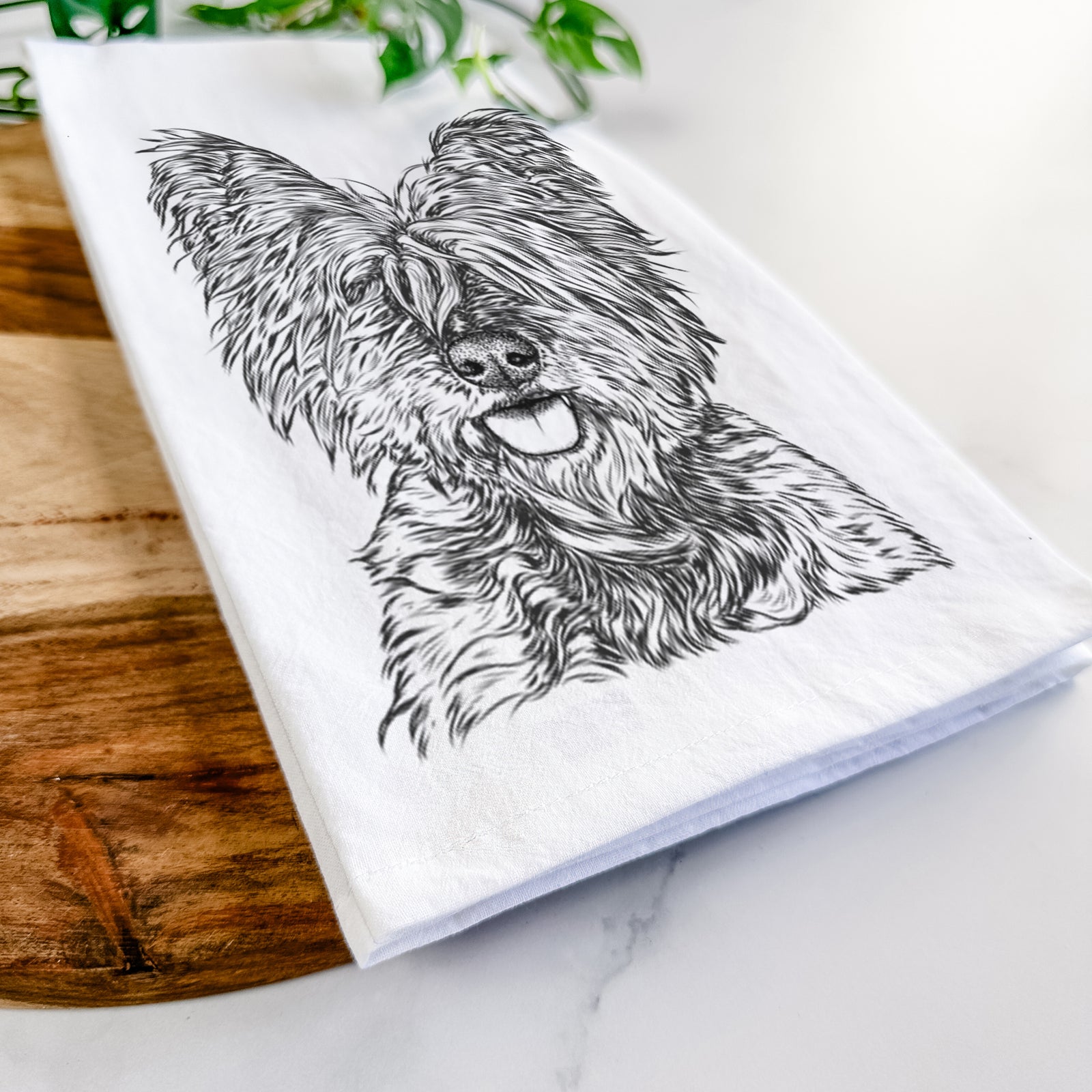 Hand-drawn sketch of McDuff the Cairn Terrier on a tea towel
