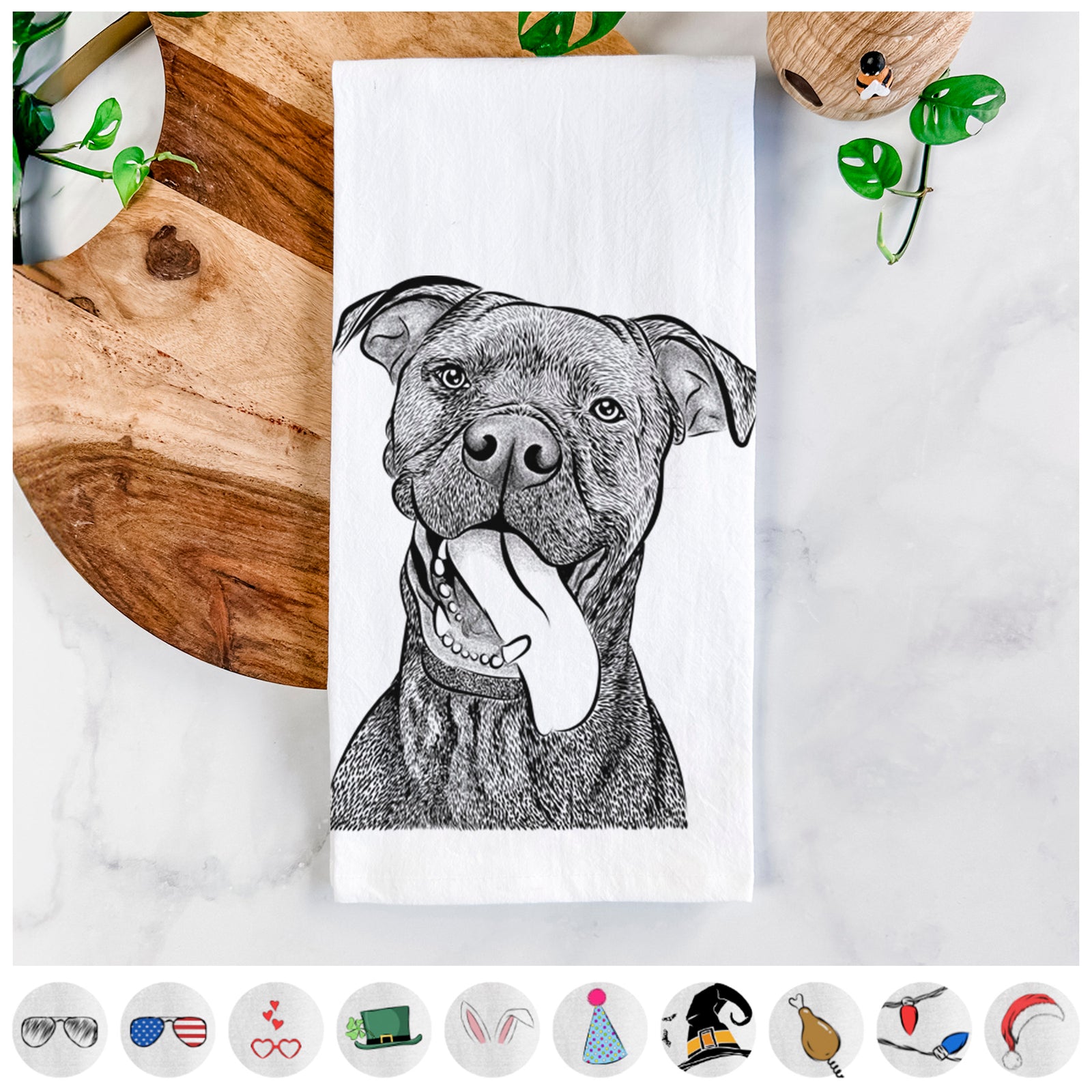 Hand-drawn sketch of Mikey the Boxador on a tea towel, shown with icons of the other available costume styles