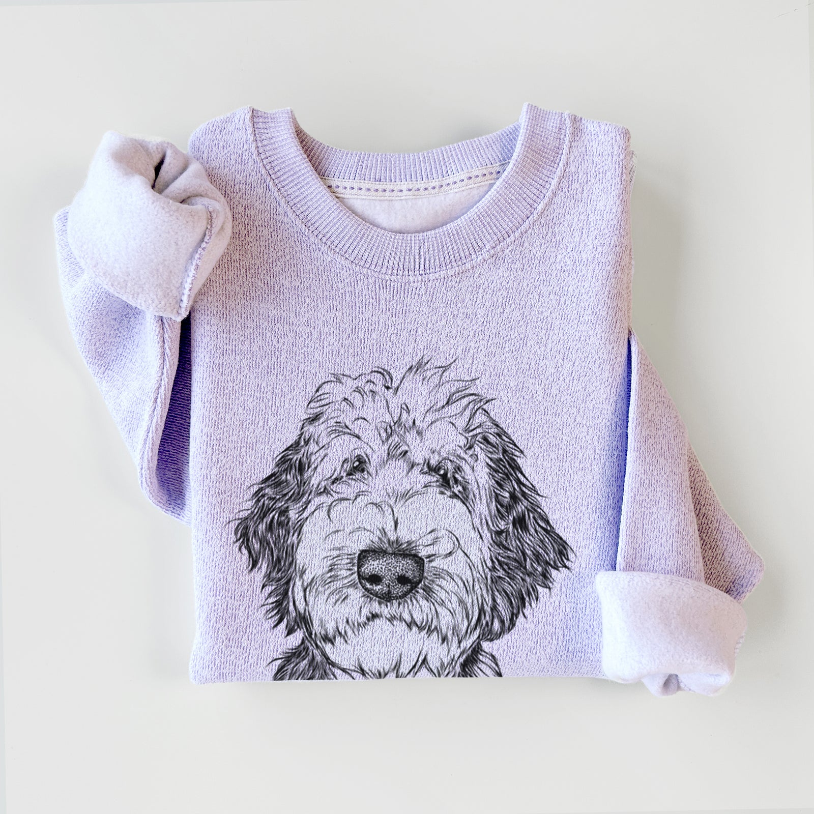 Hand-drawn sketch of Milo Fluff the Sheepadoodle on an Ice Purple knit sweatshirt