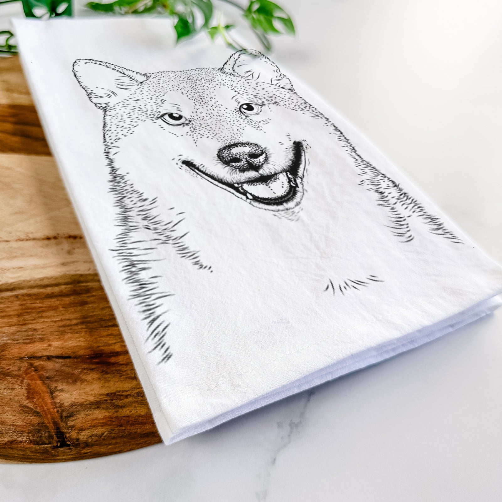 Hand-drawn sketch of Mitsu the Shiba Inu on a tea towel
