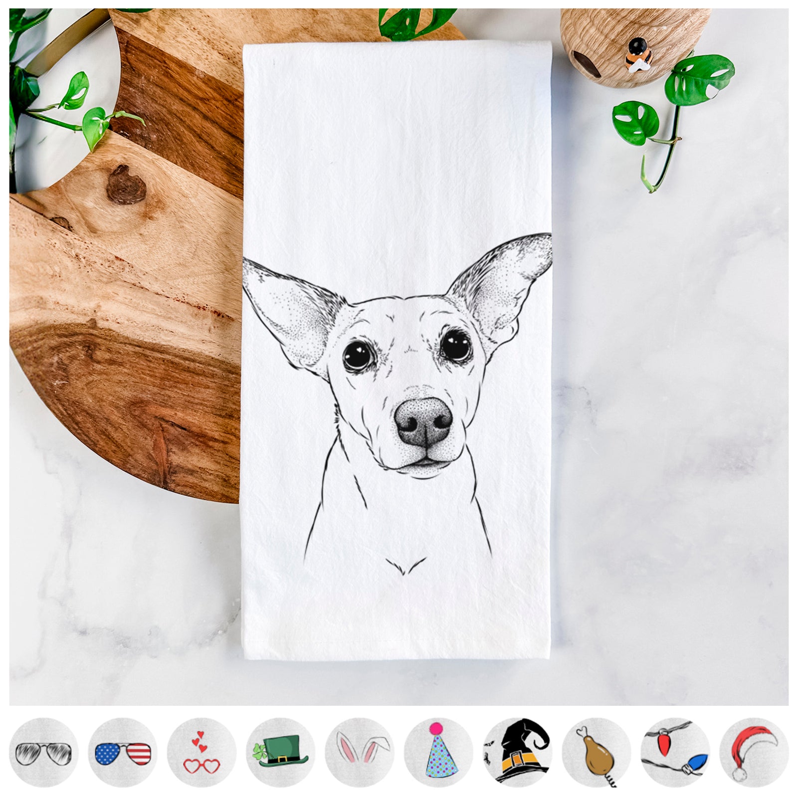 Hand-drawn sketch of Molly the Jack Russell Terrier on a tea towel, shown with icons of the other available costume styles