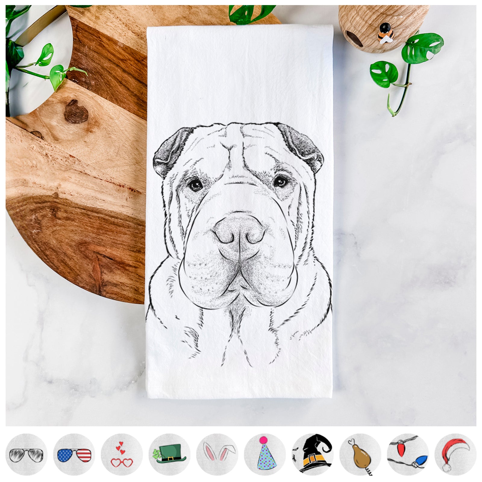 Hand-drawn sketch of Moomers the Shar Pei on a tea towel, shown with icons of the other available costume styles