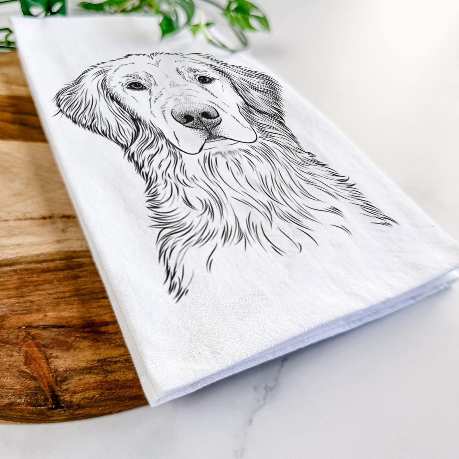 Hand-drawn sketch of Moose the Field Golden Retriever on a tea towel