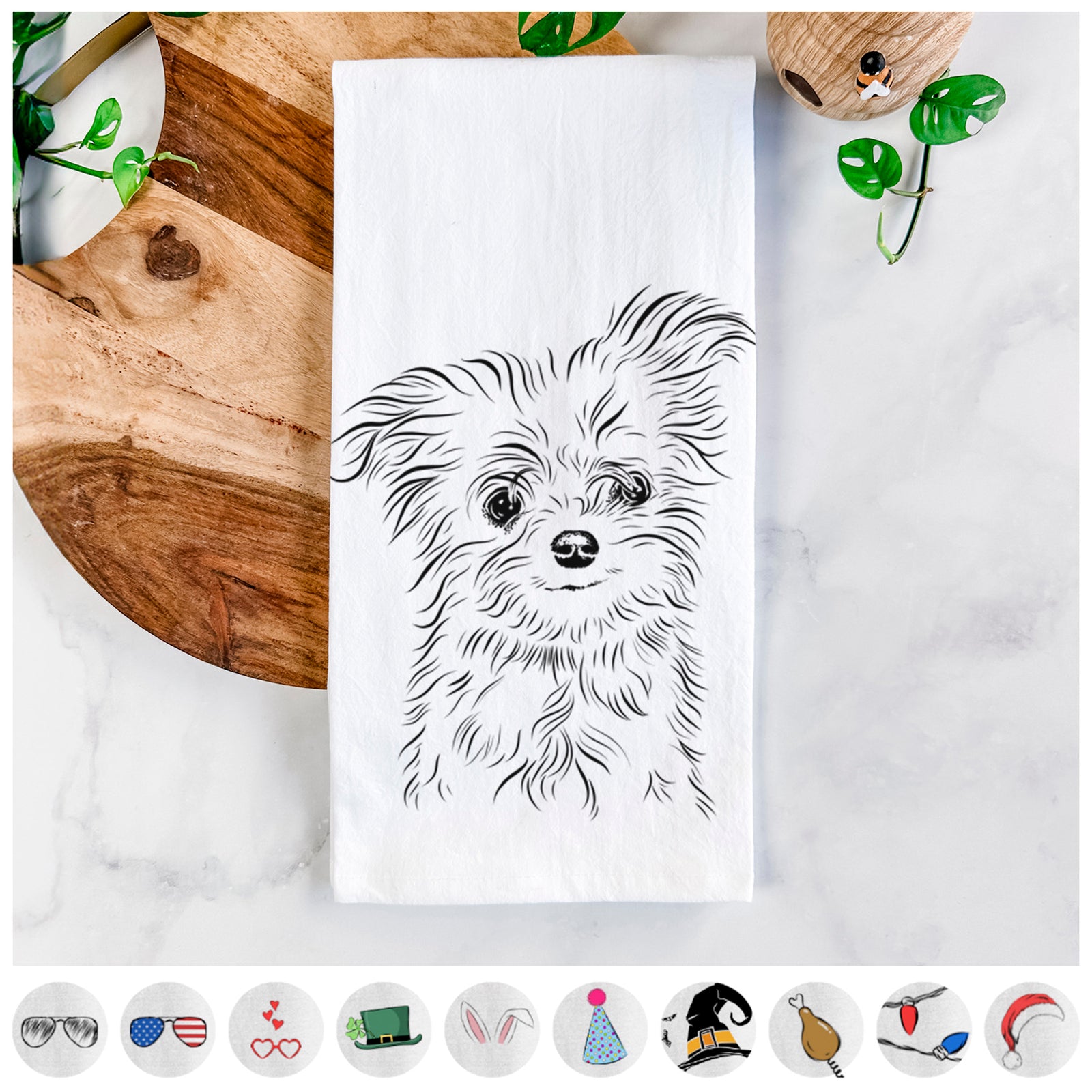 Hand-drawn sketch of Mr. Gucci Poochi the Maltese on a tea towel, shown with icons of the other available costume styles