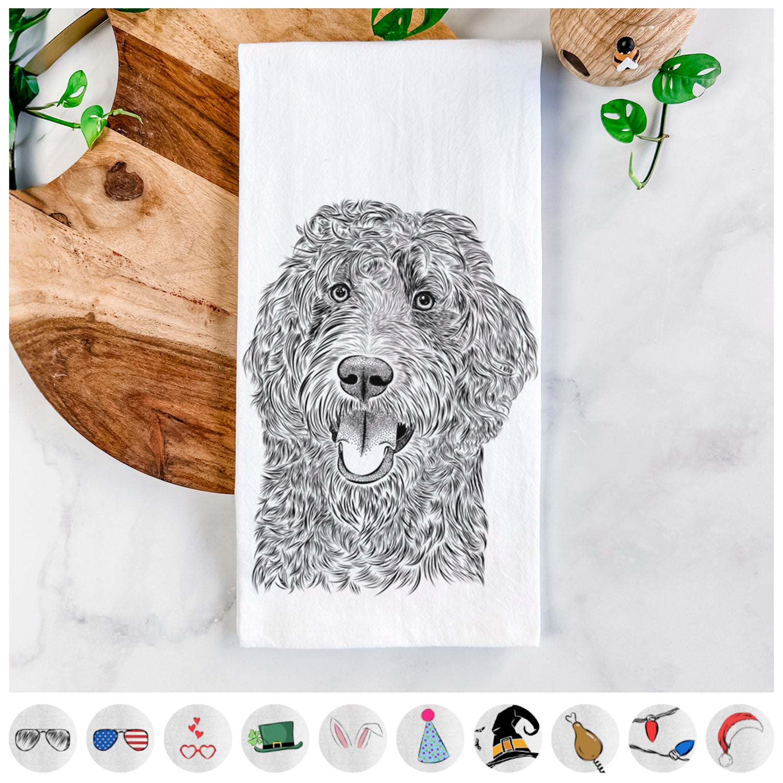 Hand-drawn sketch of Murr Dog the Labradoodle on a tea towel, shown with icons of the other available costume styles