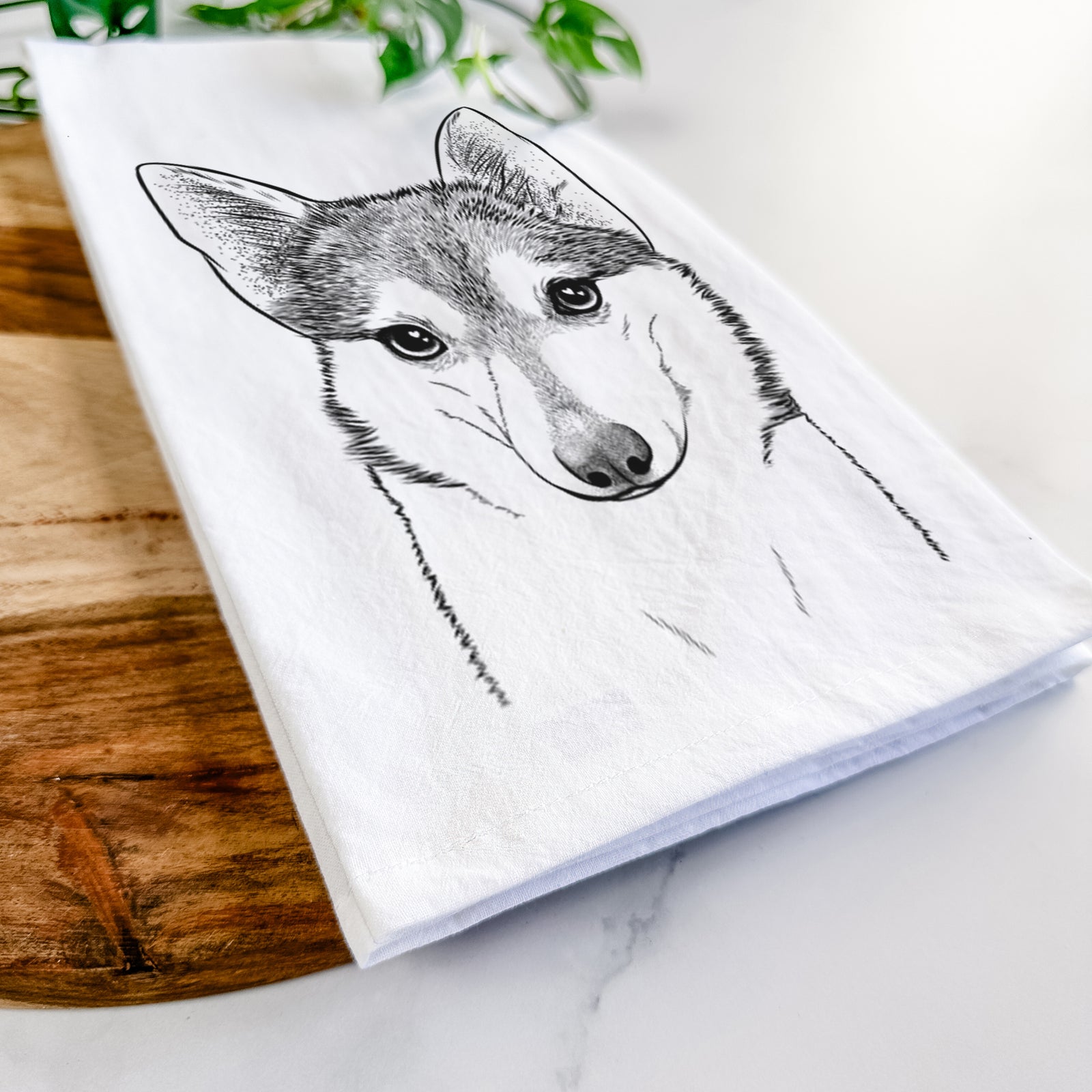 Hand-drawn sketch of Nami the Alaskan Klee Kai on a tea towel