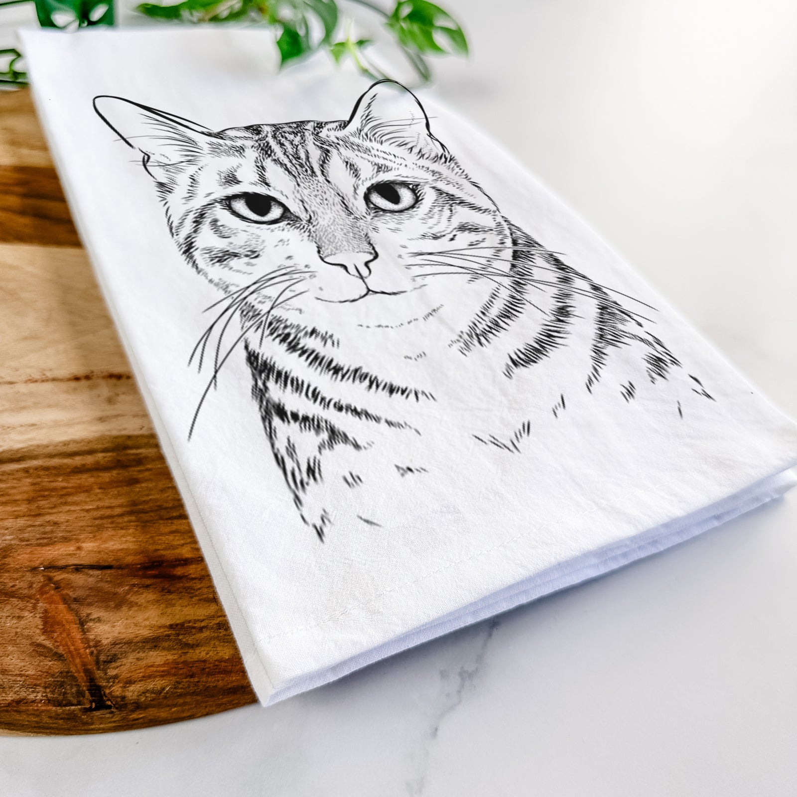 Hand-drawn sketch of Nell the Tabby Cat on a tea towel