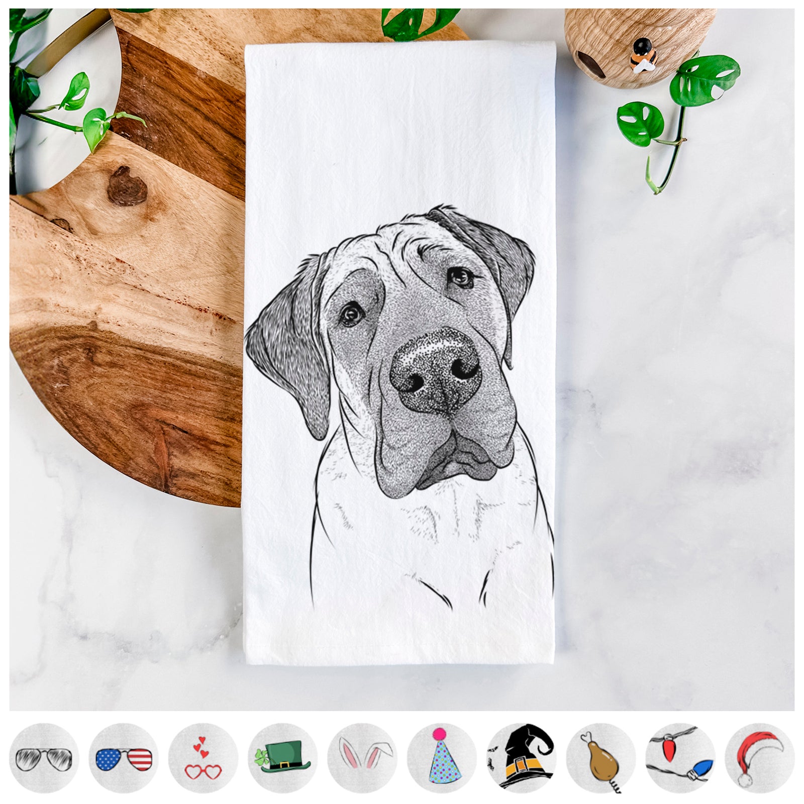 Hand-drawn sketch of Nutterbutter the English Mastiff on a tea towel, shown with icons of the other available costume styles